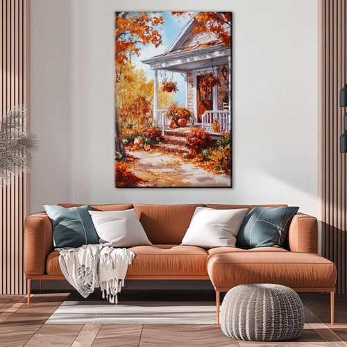 a cozy living room with a large painting of a house with a porch and autumn foliage hanging on the wall above a brown sofa with throw pillows.
