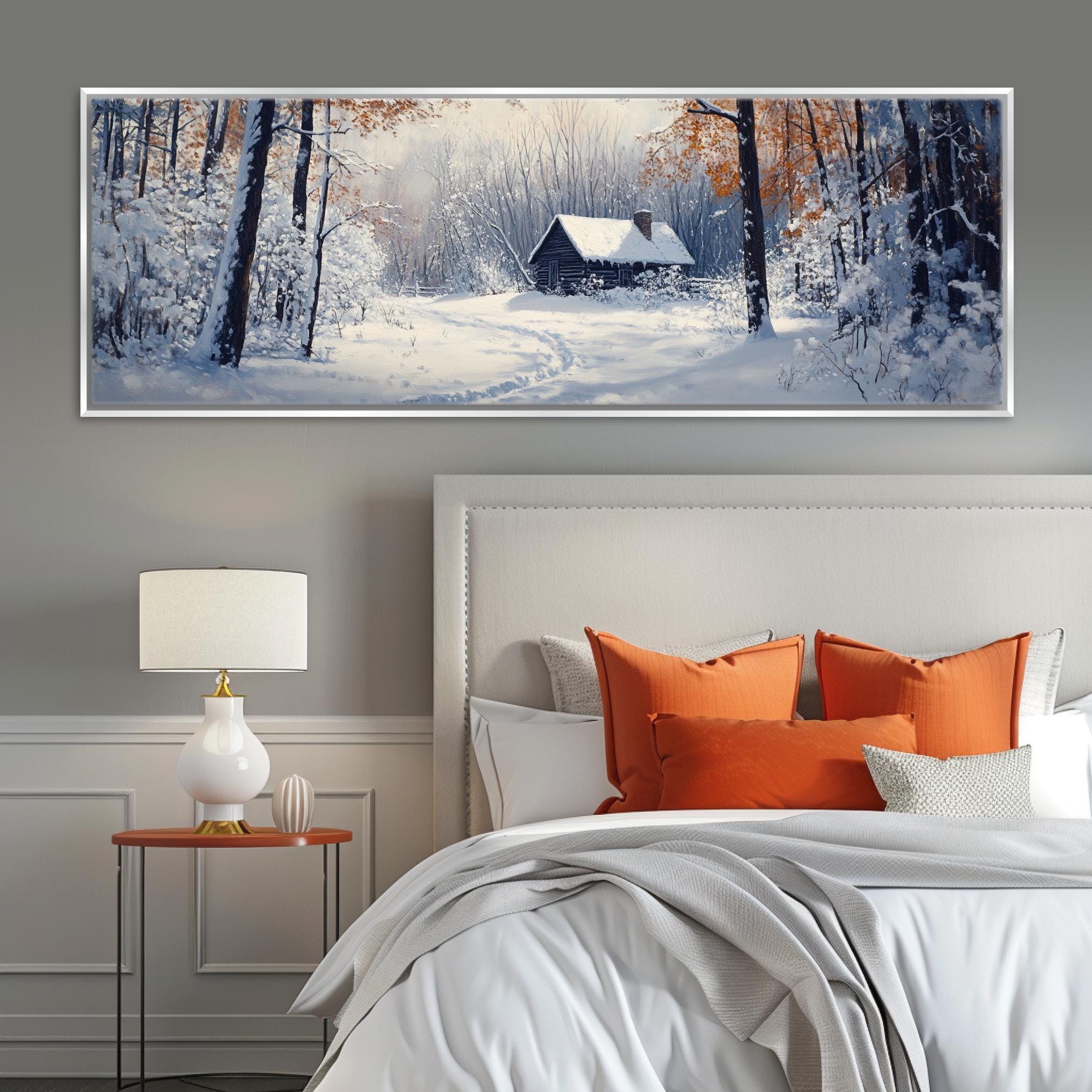 a bedroom with a bed and a painting on the wall