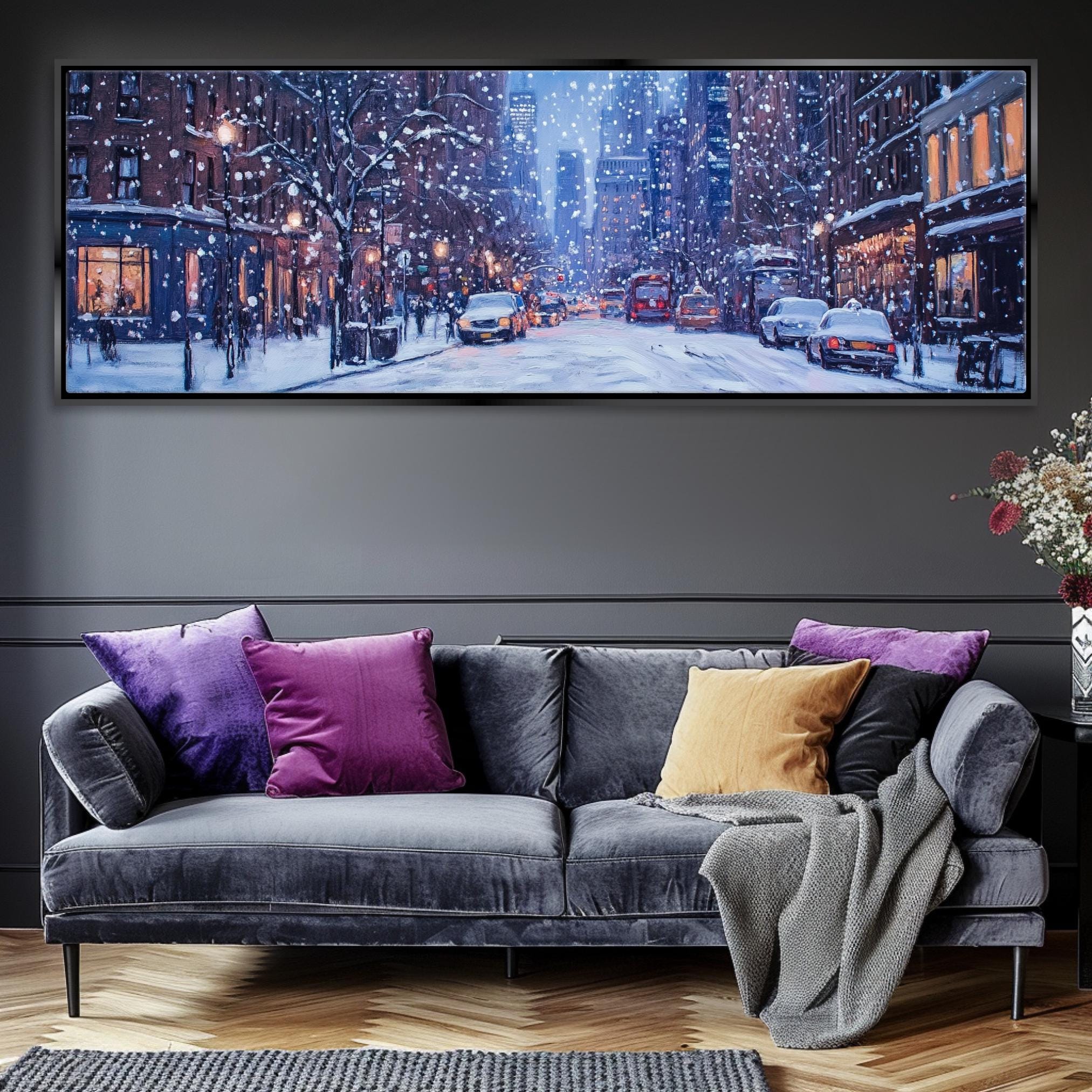 a living room with a couch and a painting on the wall