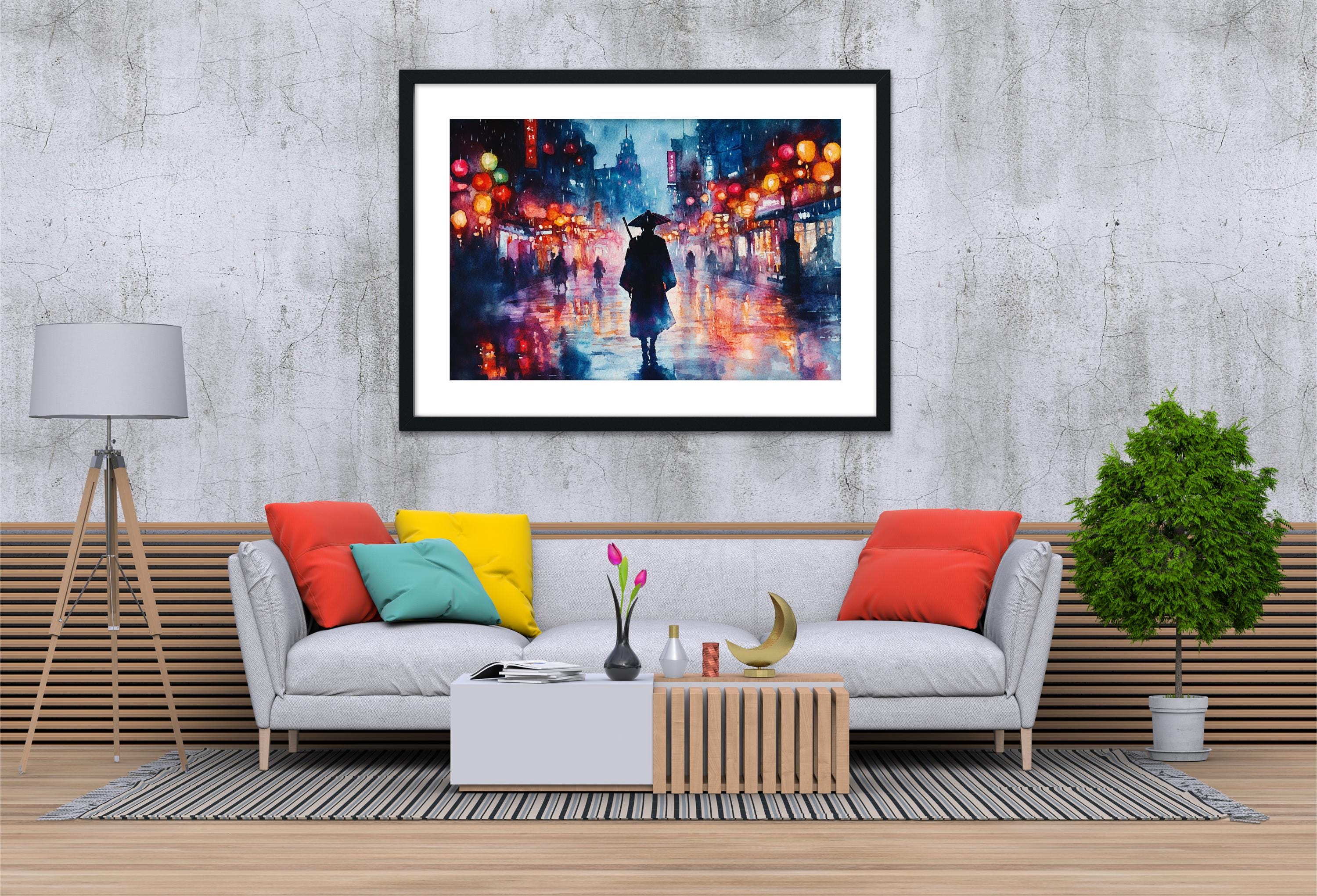 a cozy living room with a gray sofa adorned with colorful throw pillows, a wooden coffee table, and a framed painting of a person walking in the rain. The painting is hung on a concrete wall above the sofa, creating a visually appealing and inviting atmosphere.