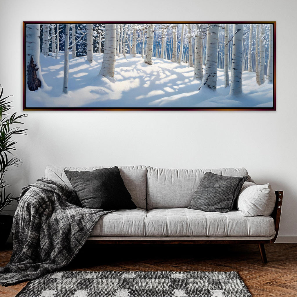 a living room with a couch and a painting on the wall