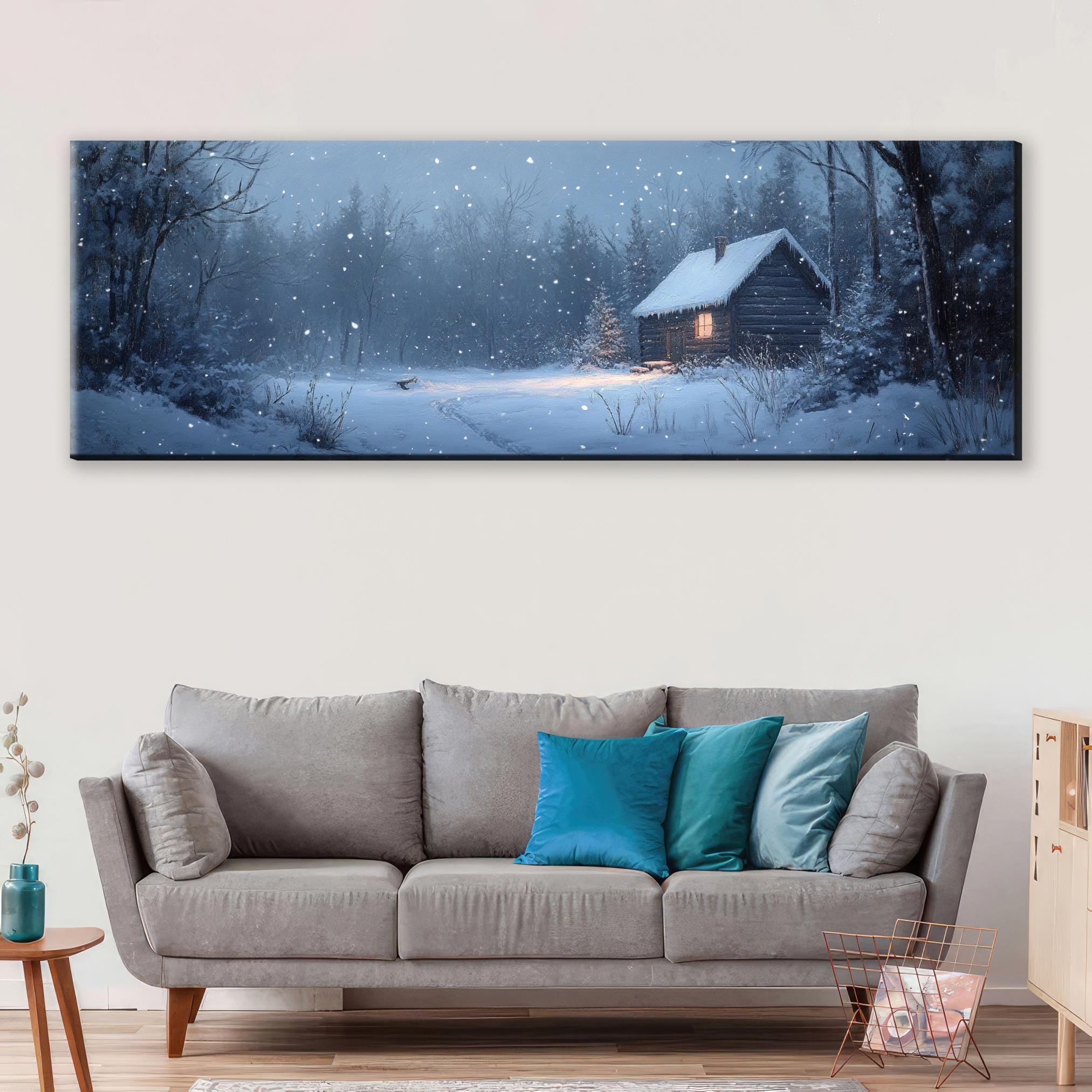 a living room with a couch and a painting on the wall