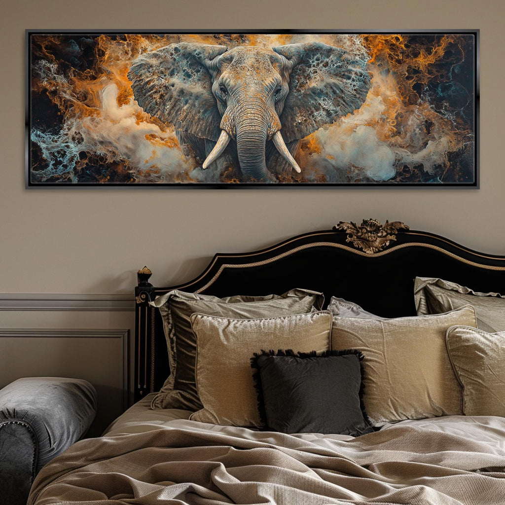 a painting of an elephant on a wall above a bed