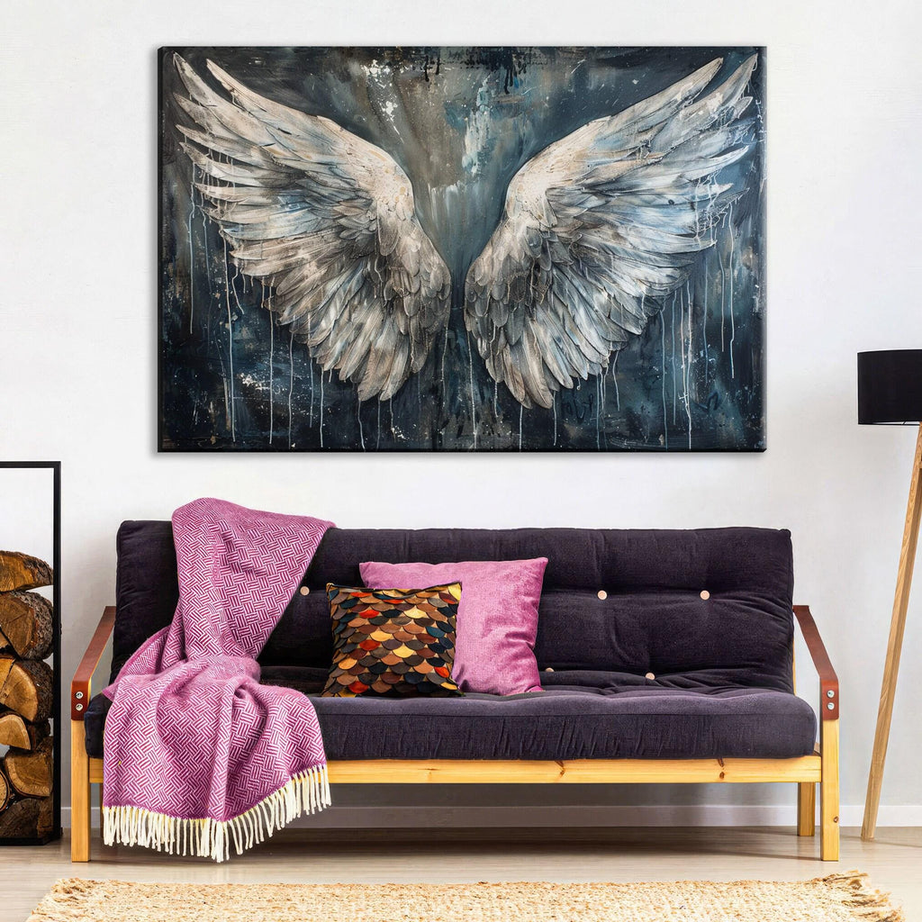 a large painting of white wings hanging on a wall above a purple couch with colorful throw pillows.
