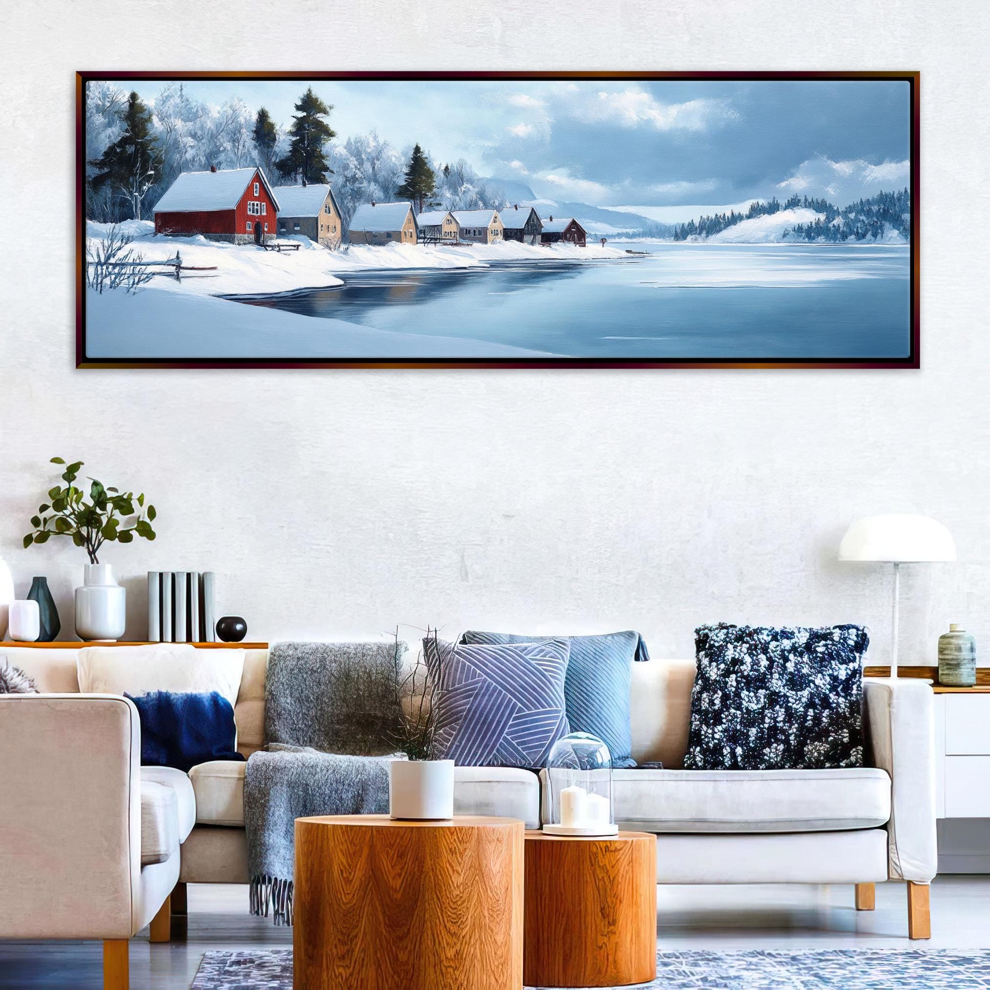 a living room with a couch and a painting on the wall