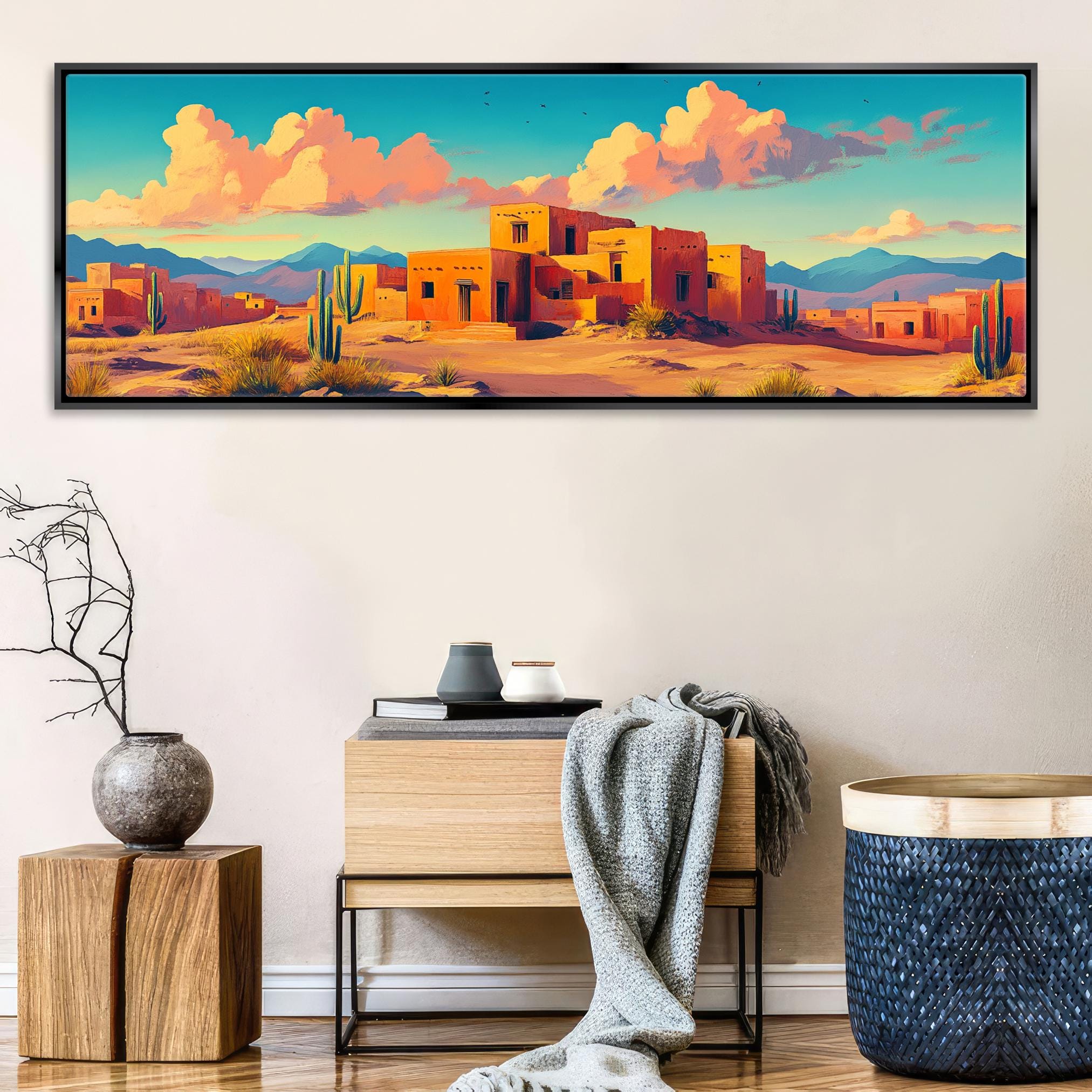 a painting of a desert town with mountains in the background