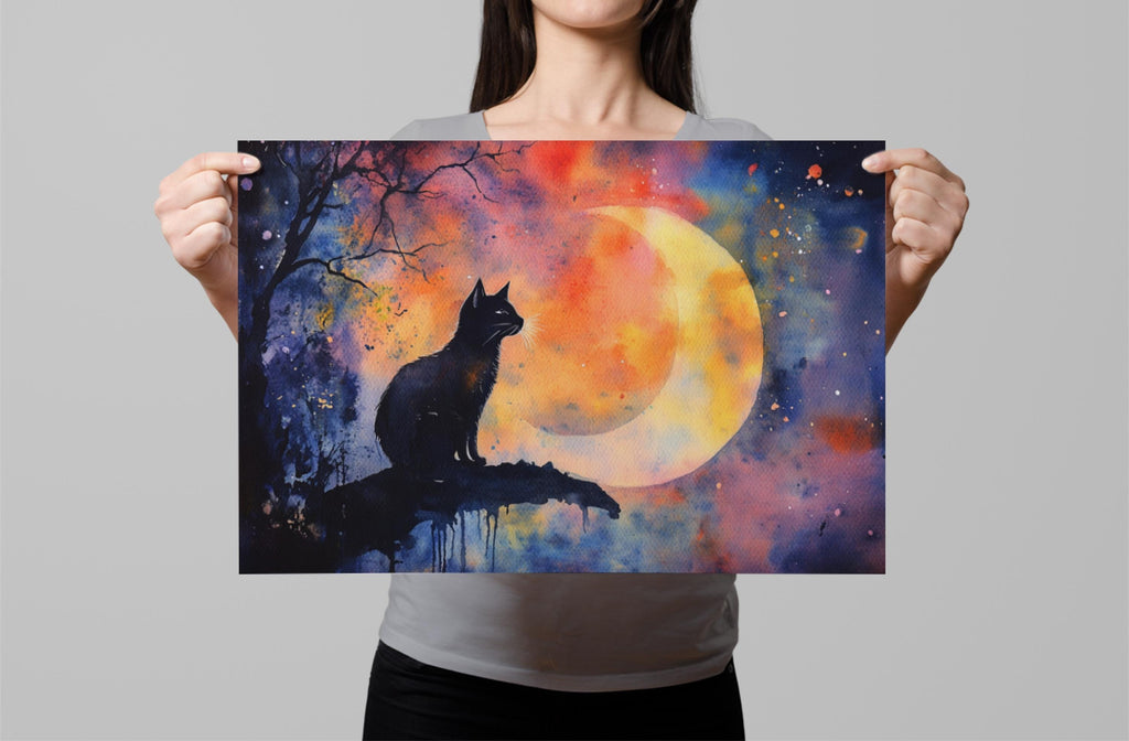 A woman holds up a framed painting depicting a black cat sitting on a rock, gazing up at a crescent moon against a colorful night sky.