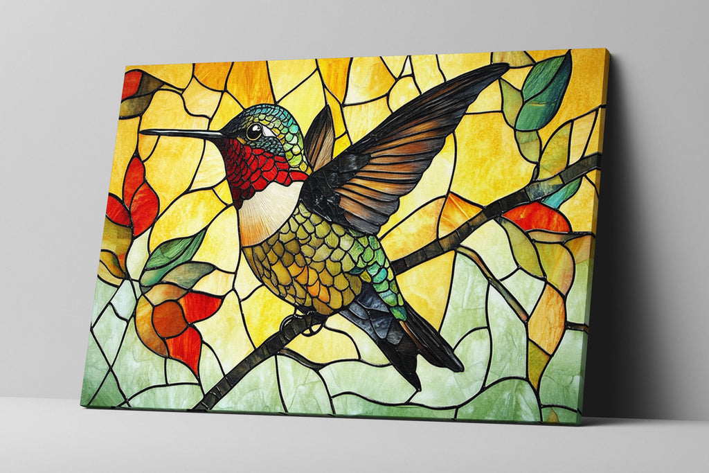 a stained glass picture of a hummingbird perched on a branch