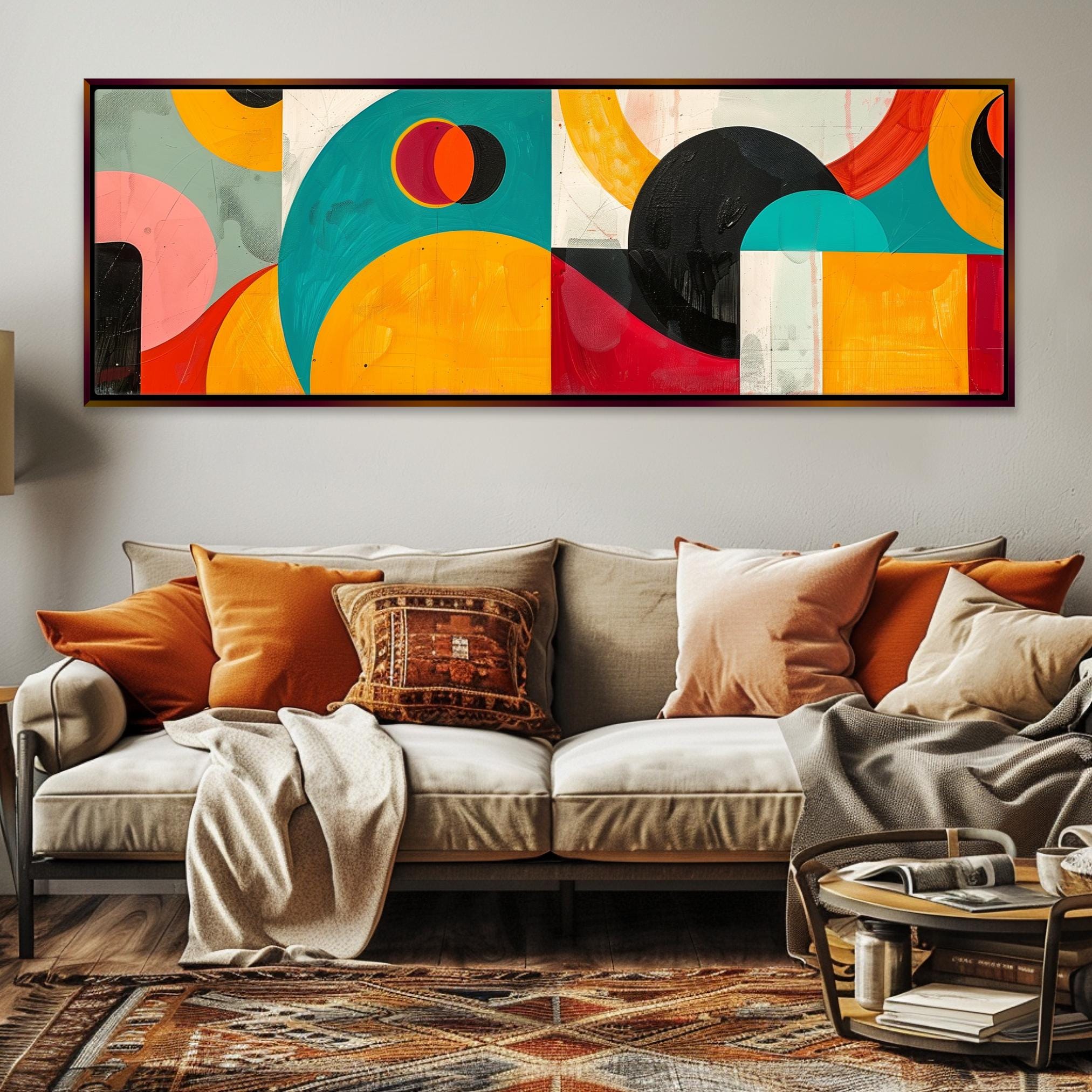 a living room with a couch and a painting on the wall