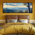 a large painting hangs above a bed in a bedroom