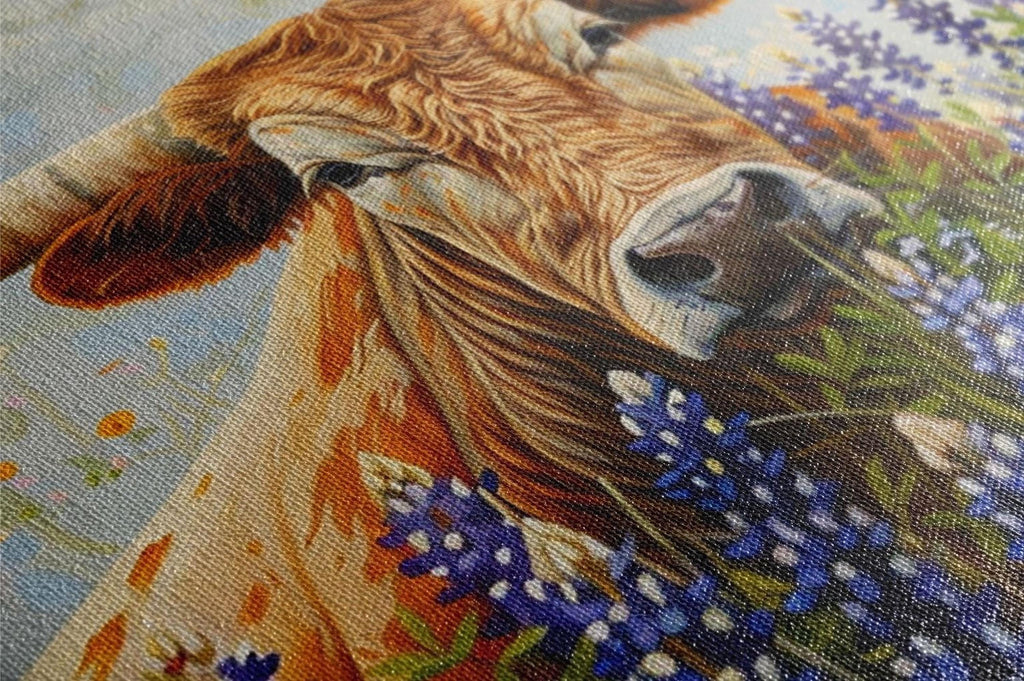 A close-up of a cow's face, with its eyes and nose prominently featured, surrounded by a vibrant display of blue and purple flowers.
