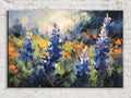 The image is a vibrant painting depicting a field of blue lupine flowers against a backdrop of lush green foliage and a bright blue sky.