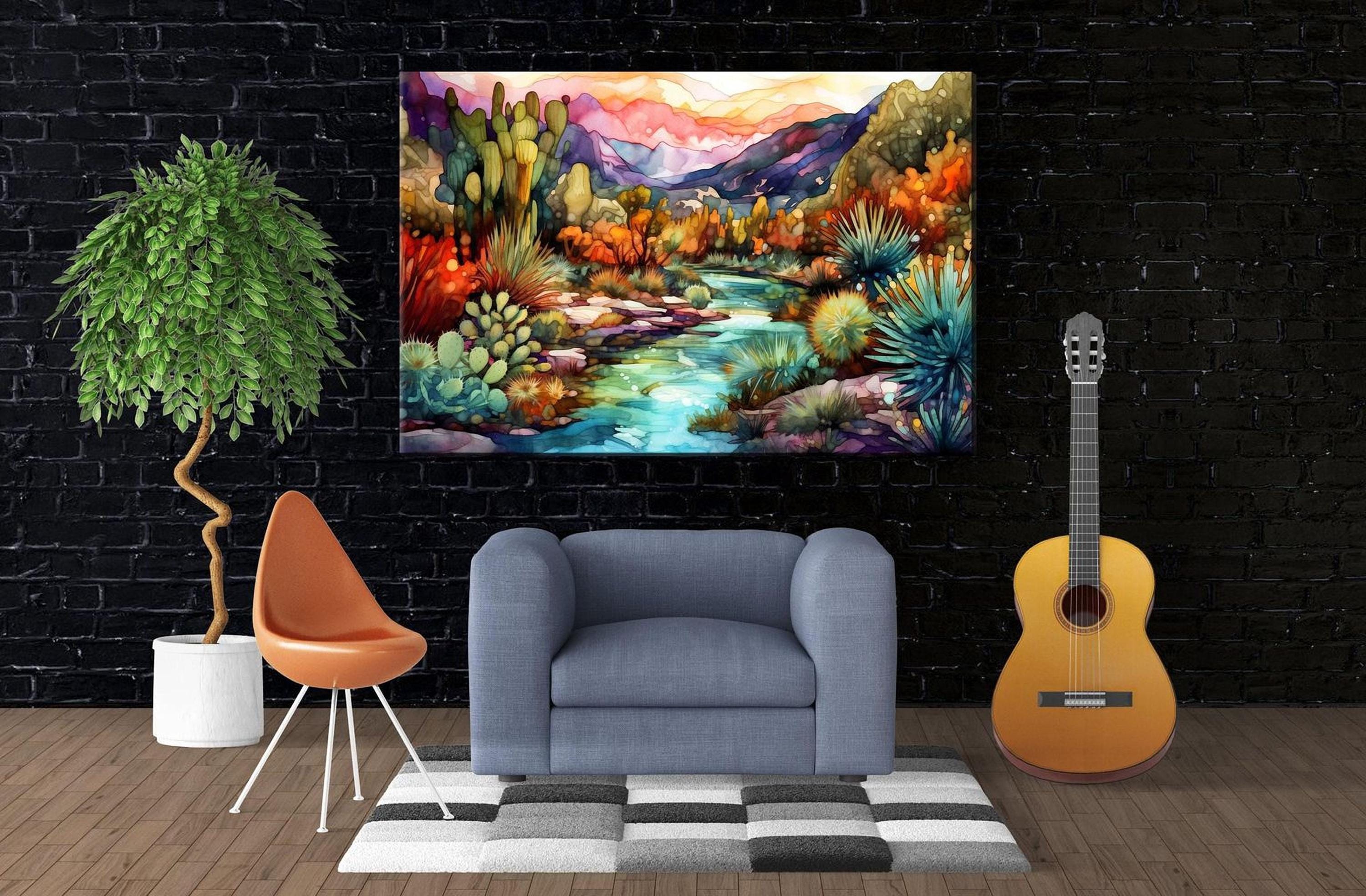 a modern living room with a large, colorful painting of a desert landscape hanging on the wall. The painting features a river, mountains, and various desert plants and animals. In the room, there is a gray armchair, a potted plant, and a guitar, creating a cozy and artistic atmosphere.
