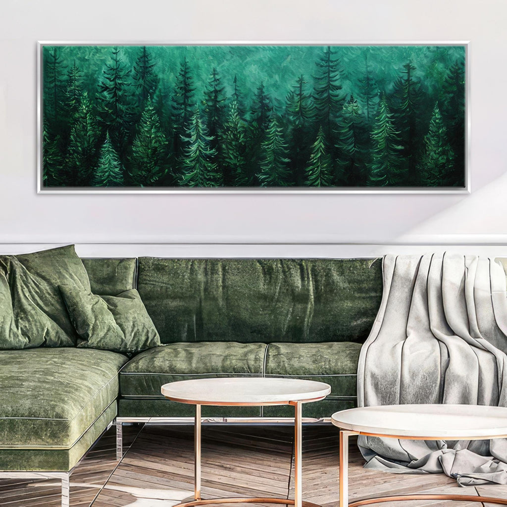 a living room with a green couch and a painting on the wall