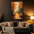 a cozy living room with a large painting of a forest path in autumn hanging on the wall above a brown leather couch.