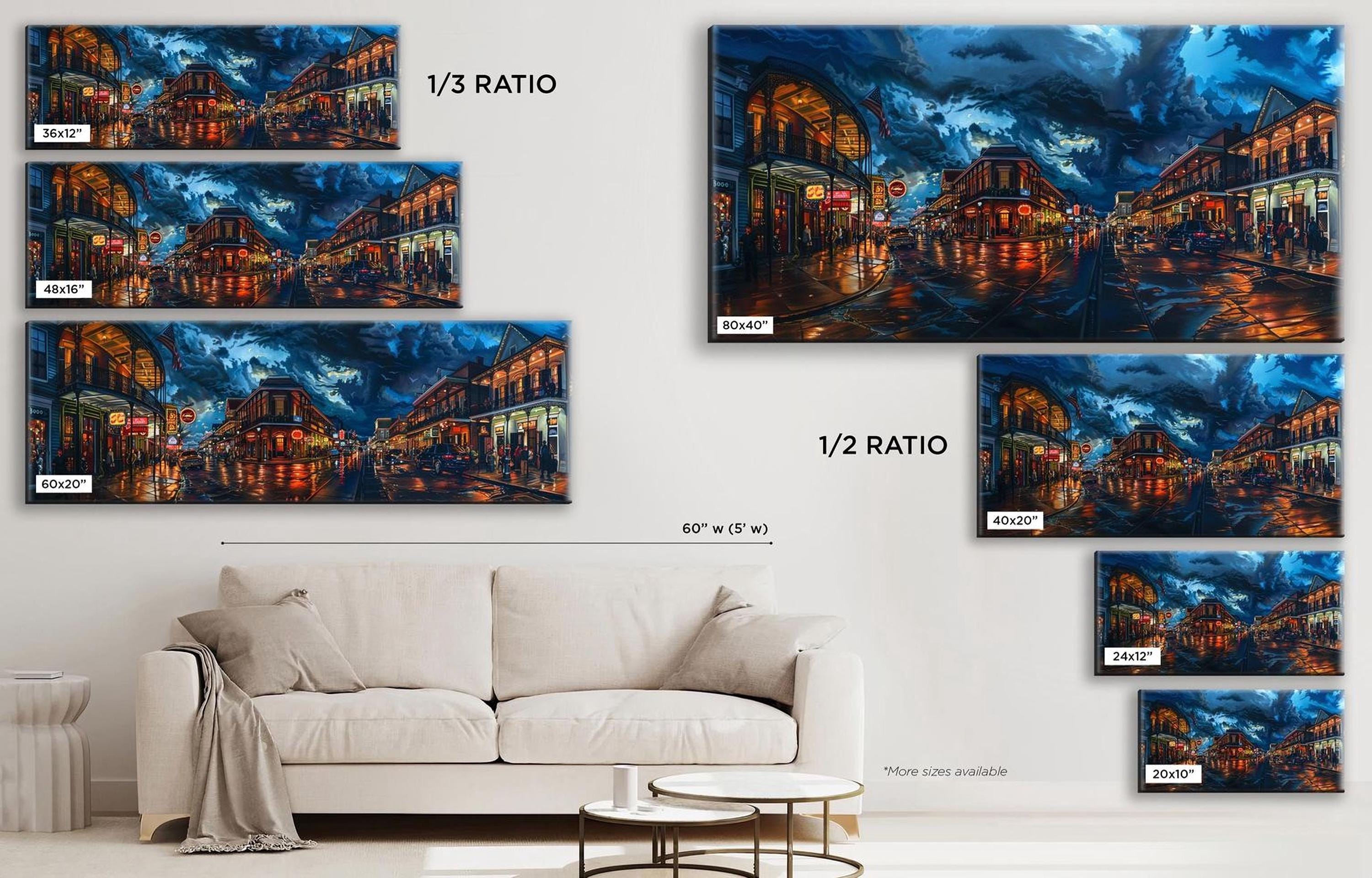 a living room with a white couch and paintings on the wall