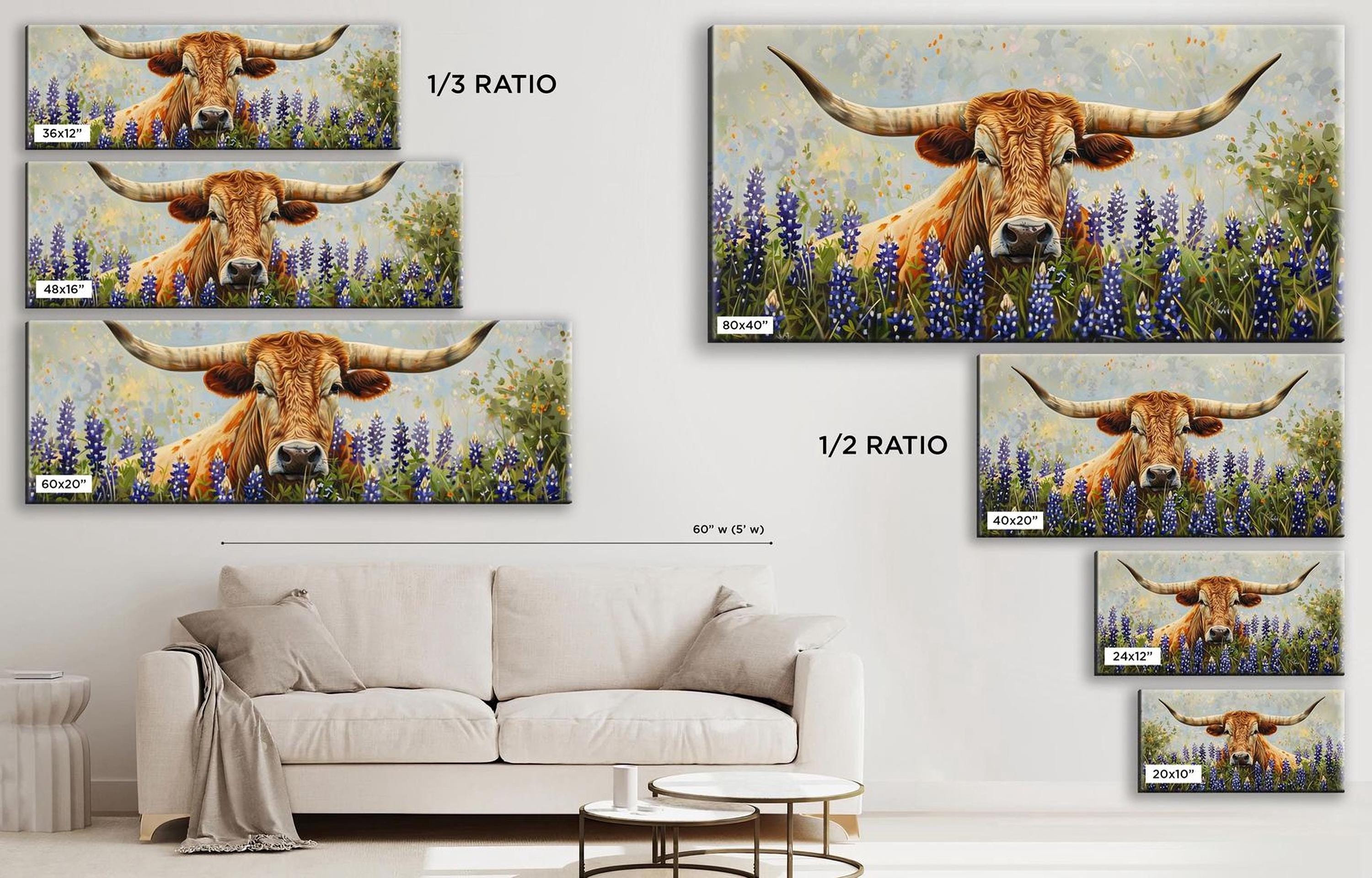 a living room with a couch and paintings on the wall