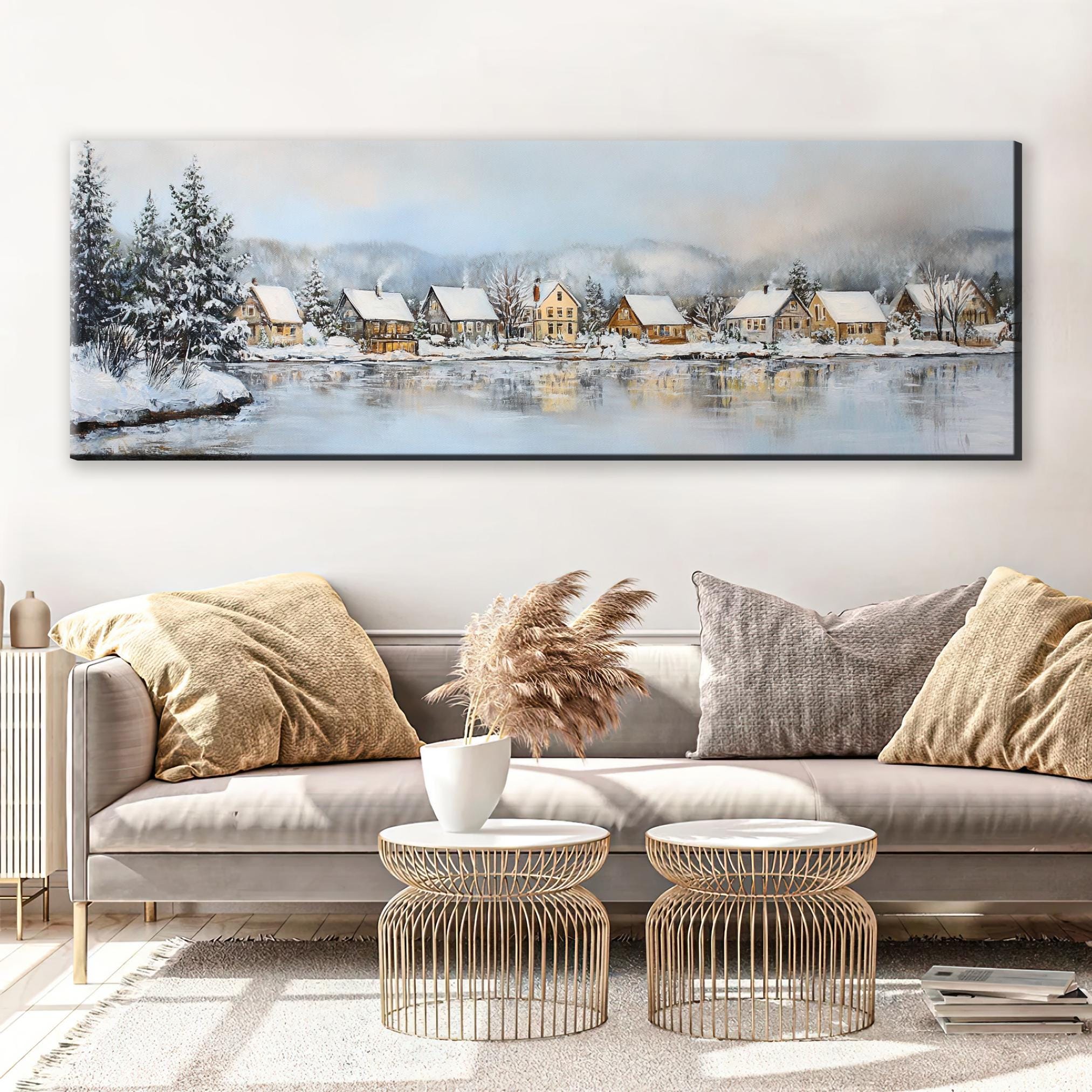 a living room with a couch and a painting on the wall