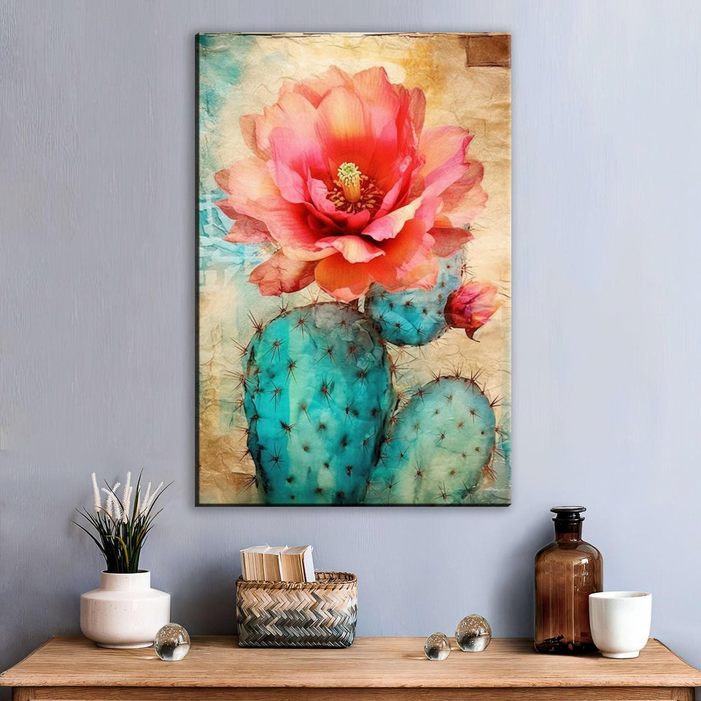 a vibrant painting of a cactus with a large, red flower blooming on it, hanging on a wall above a wooden table with various decorative items.