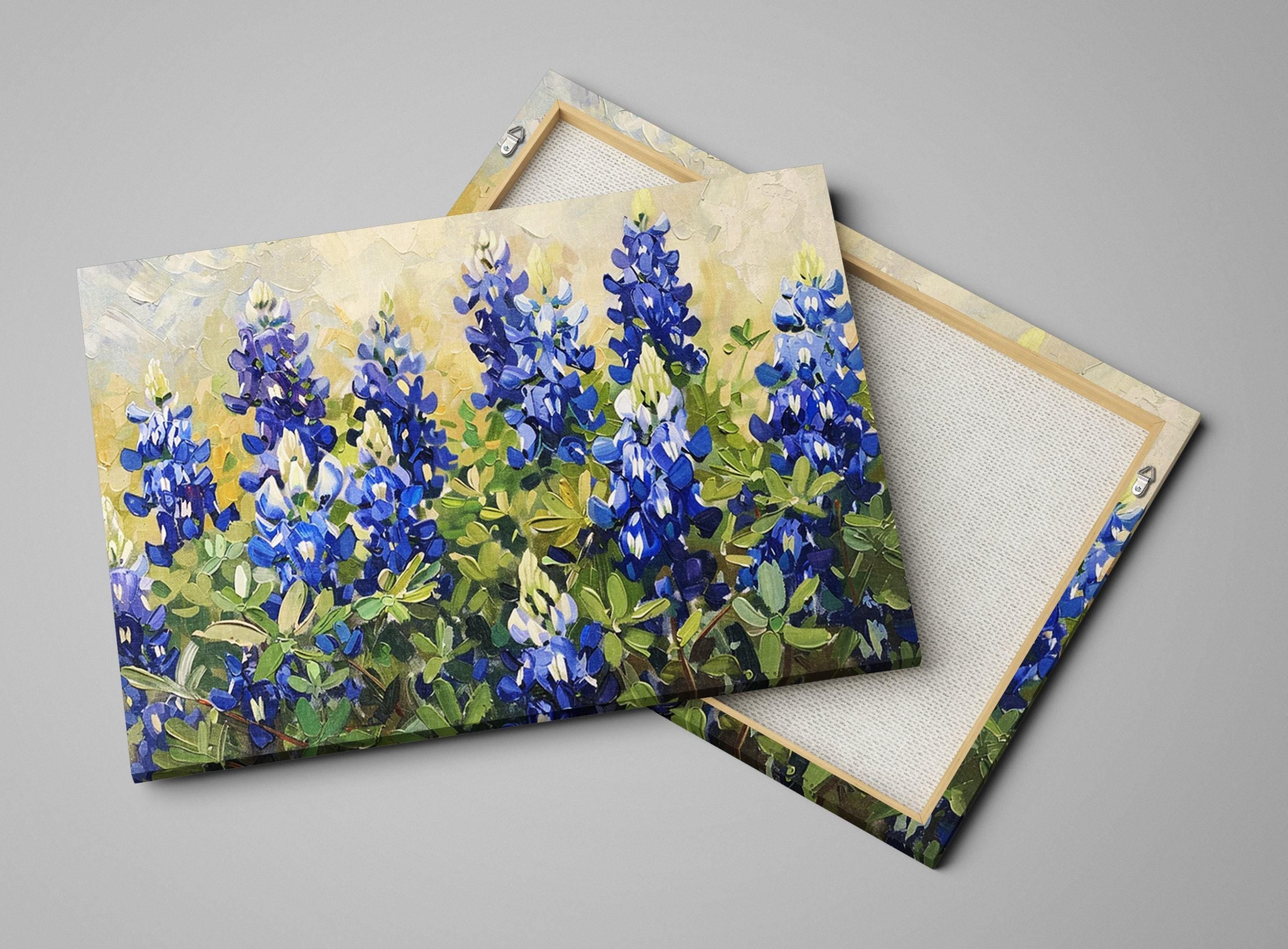 a vibrant field of blue flowers, with the flowers in full bloom and surrounded by lush green foliage.