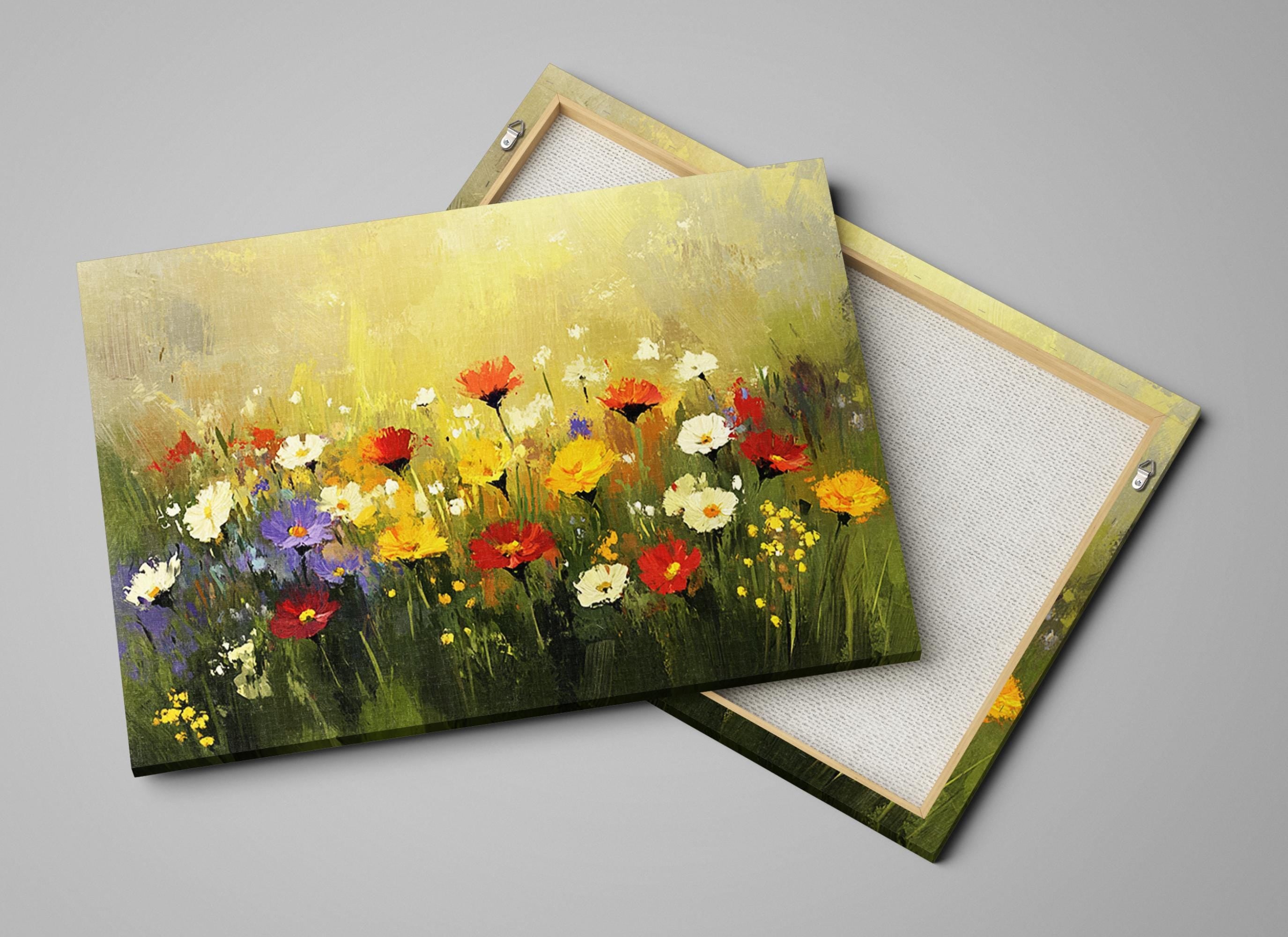 a painting of a field of flowers on a canvas