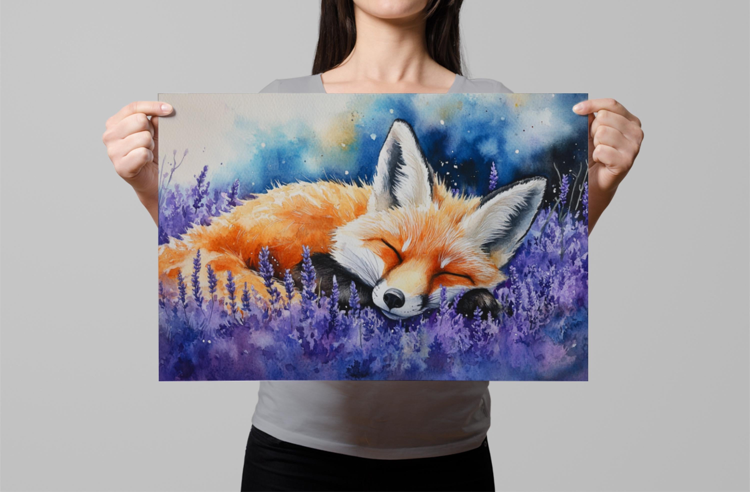 A woman holds up a framed painting of a sleeping fox in a field of purple flowers.