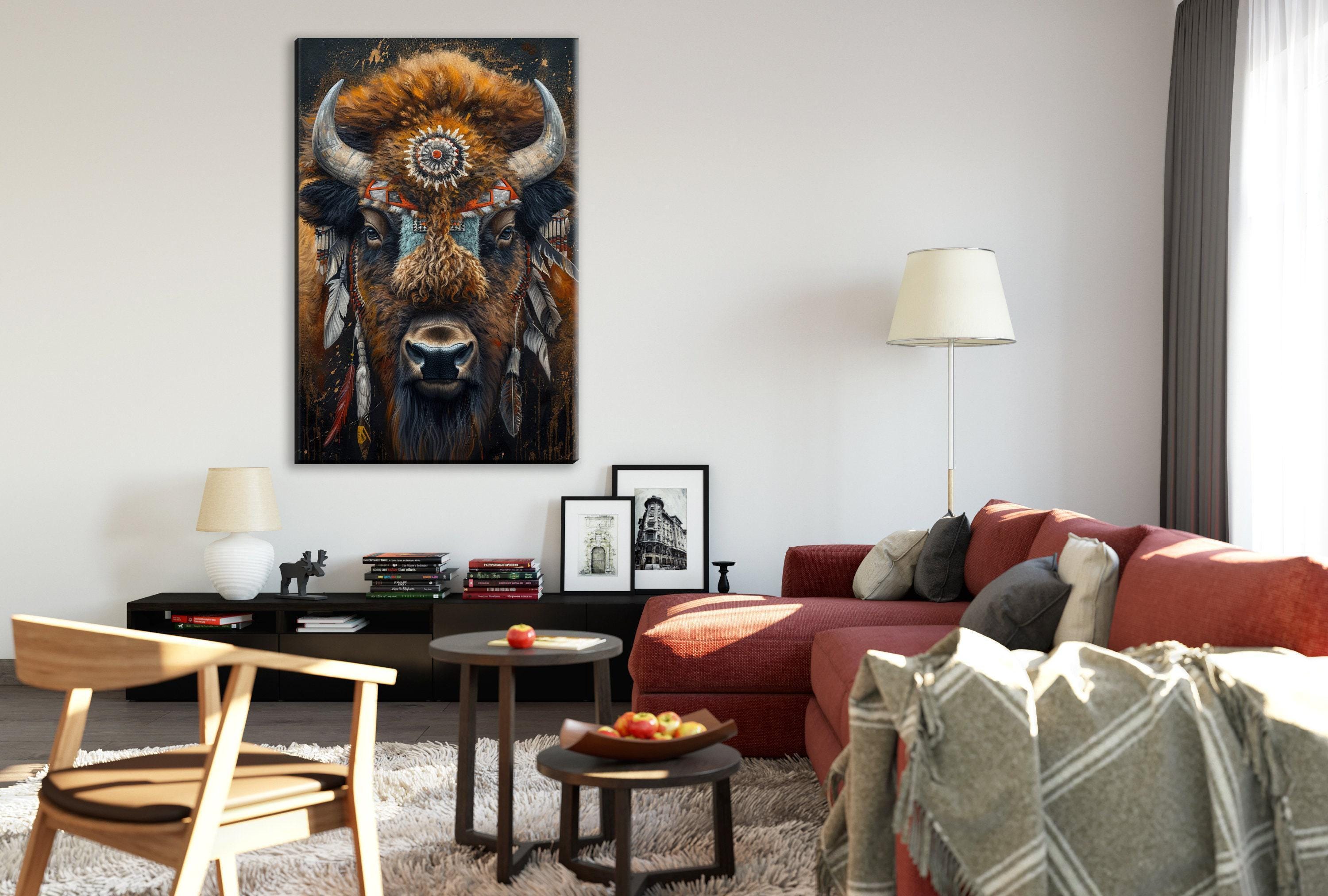 a living room with a large painting of a buffalo on the wall, a red couch, a wooden chair, and a coffee table with a bowl of fruit.