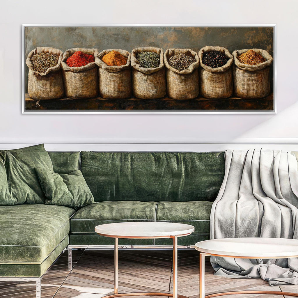 a green couch sitting in a living room under a painting