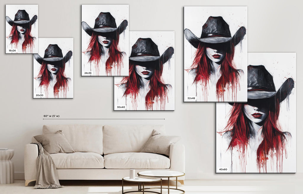 a living room with a couch and paintings on the wall