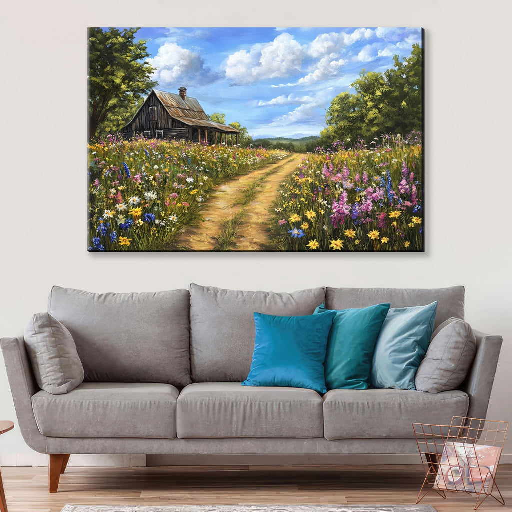 a living room with a couch and a painting on the wall