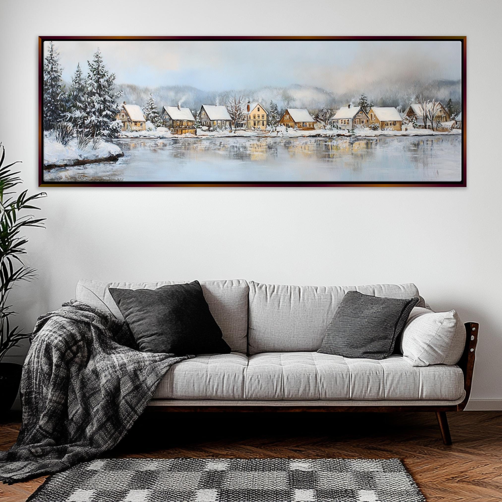 a living room with a couch and a painting on the wall