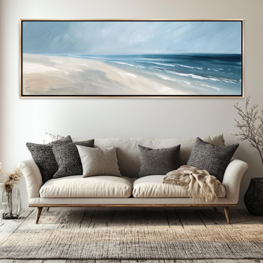 a living room with a couch and a painting on the wall