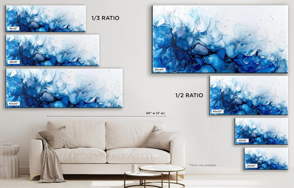 a living room with a couch and paintings on the wall