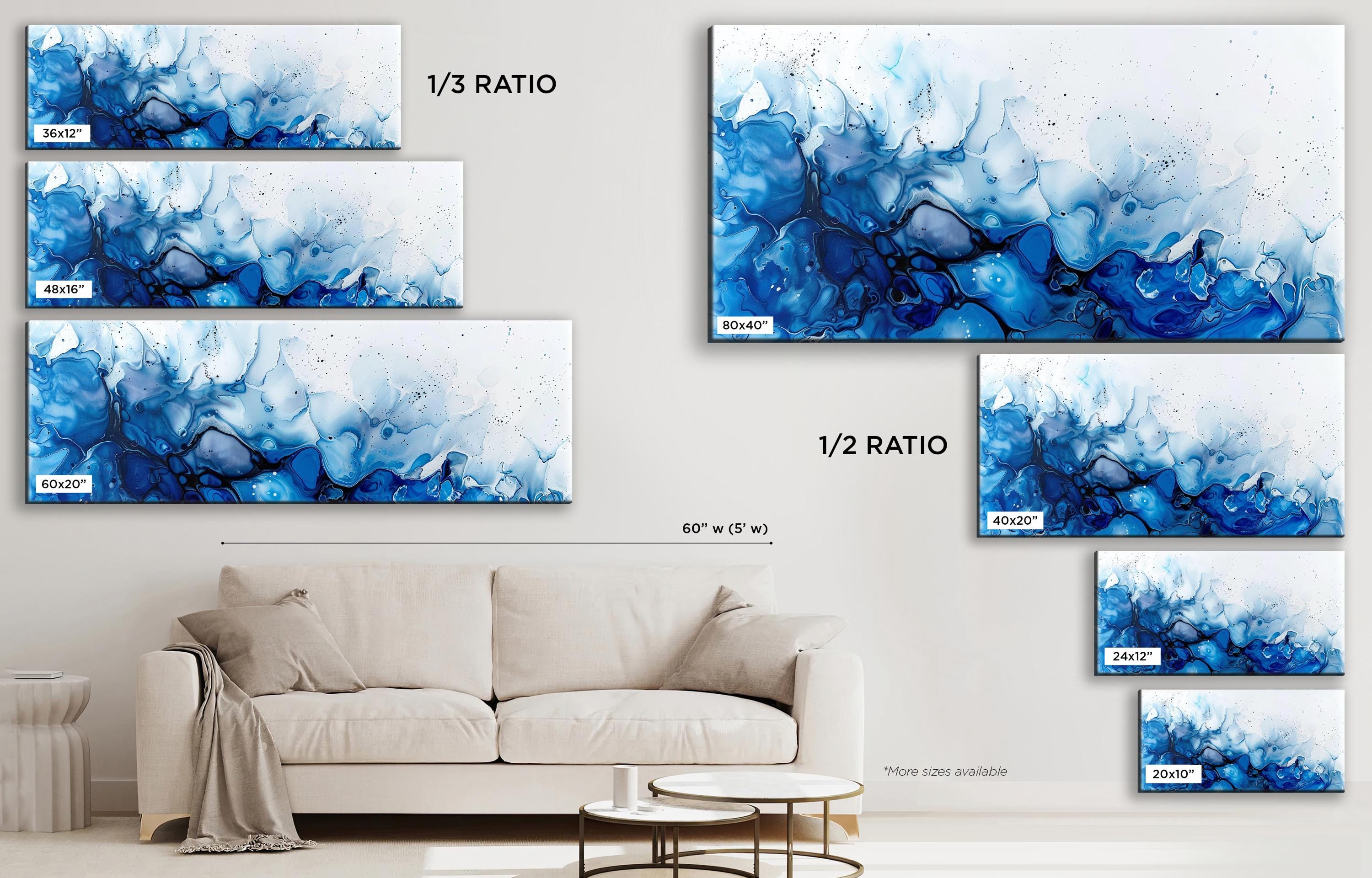 a living room with a couch and paintings on the wall