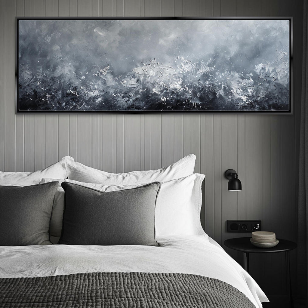 a bedroom with a large painting above the bed