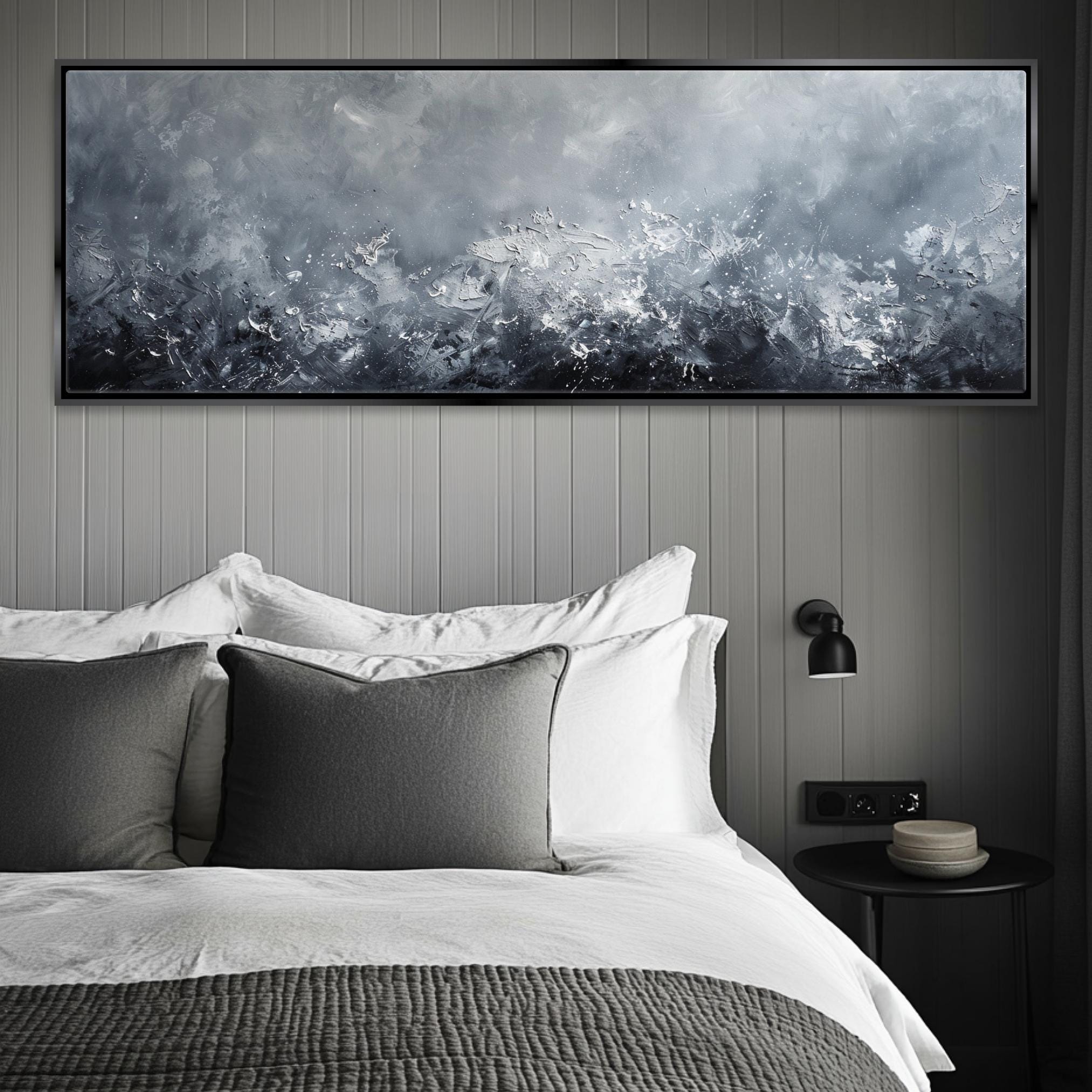 a bedroom with a large painting above the bed