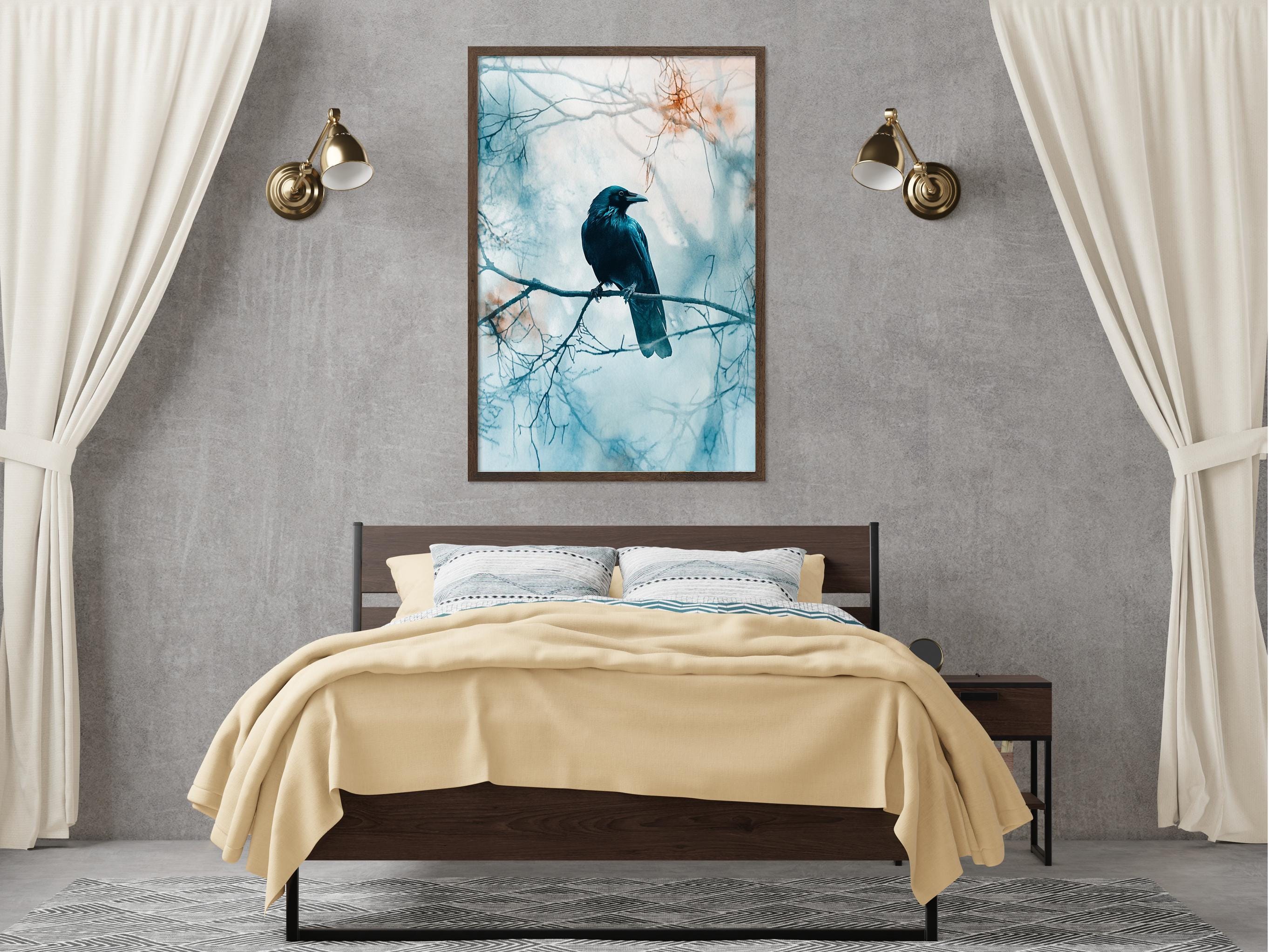 a bedroom with a bed, a nightstand, and a framed picture of a black bird perched on a branch.