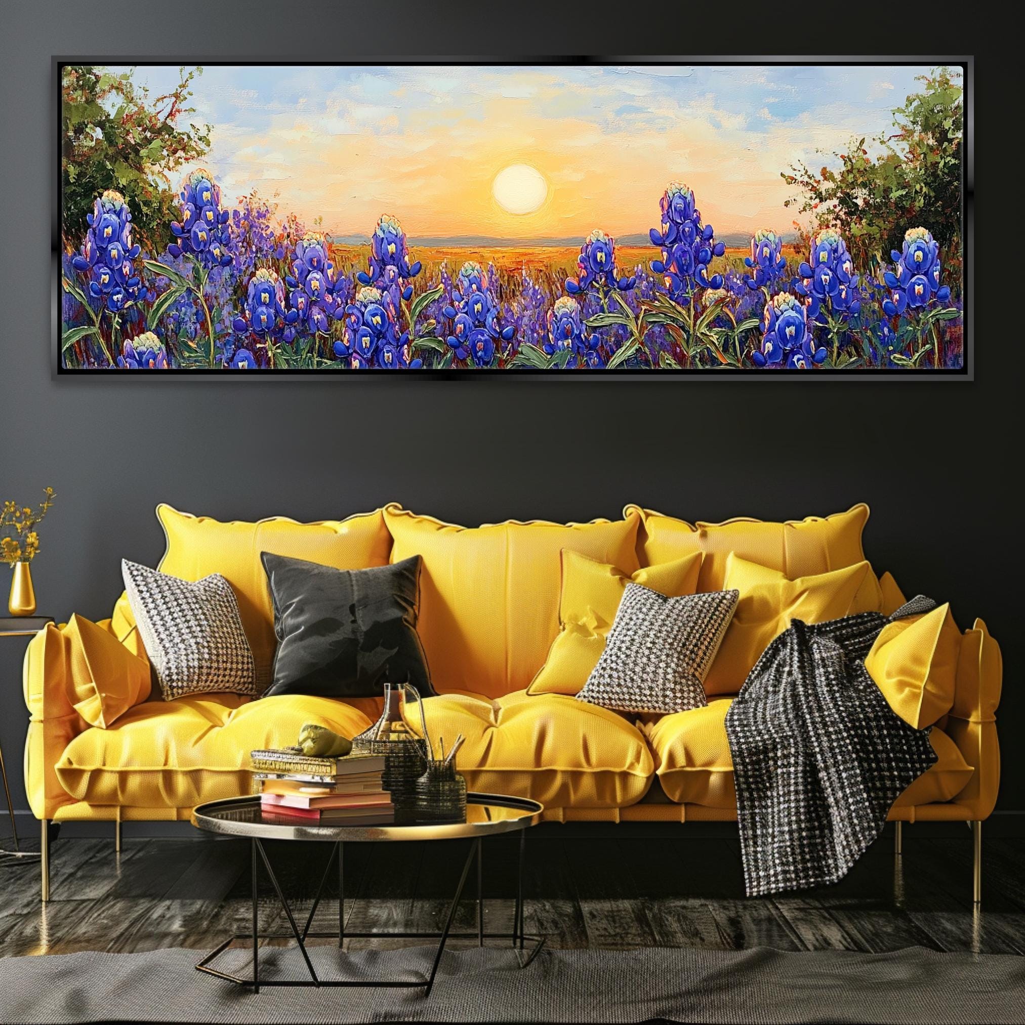 a living room with a yellow couch and a painting on the wall