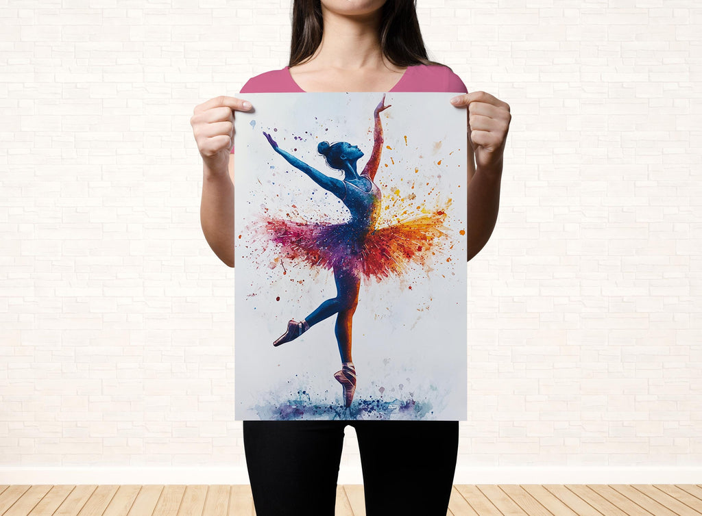 A woman is holding up a colorful painting of a ballerina in a tutu, with splashes of color on her costume.