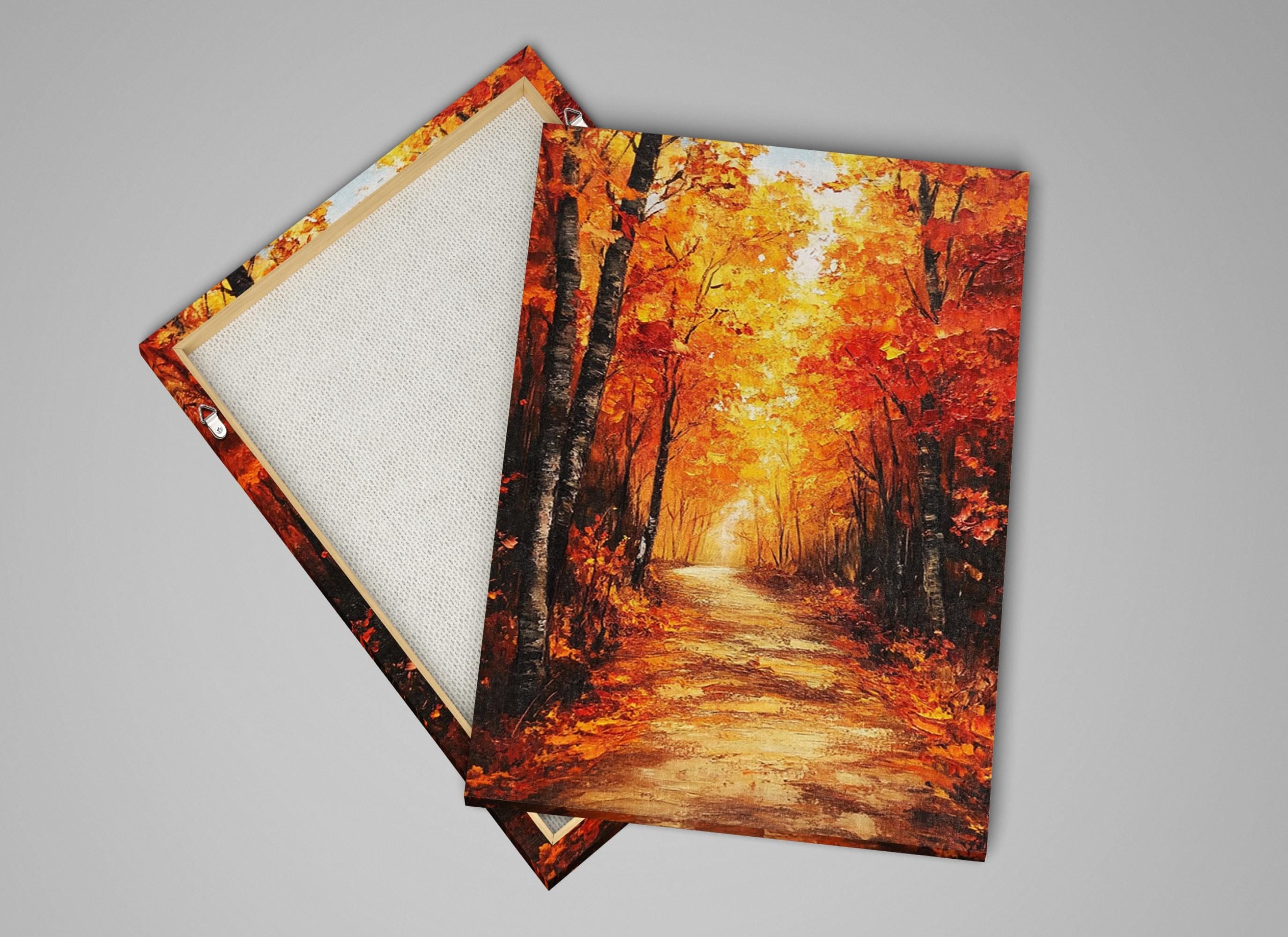 a scenic autumn landscape with a winding path leading through a forest of trees displaying vibrant orange and yellow foliage.