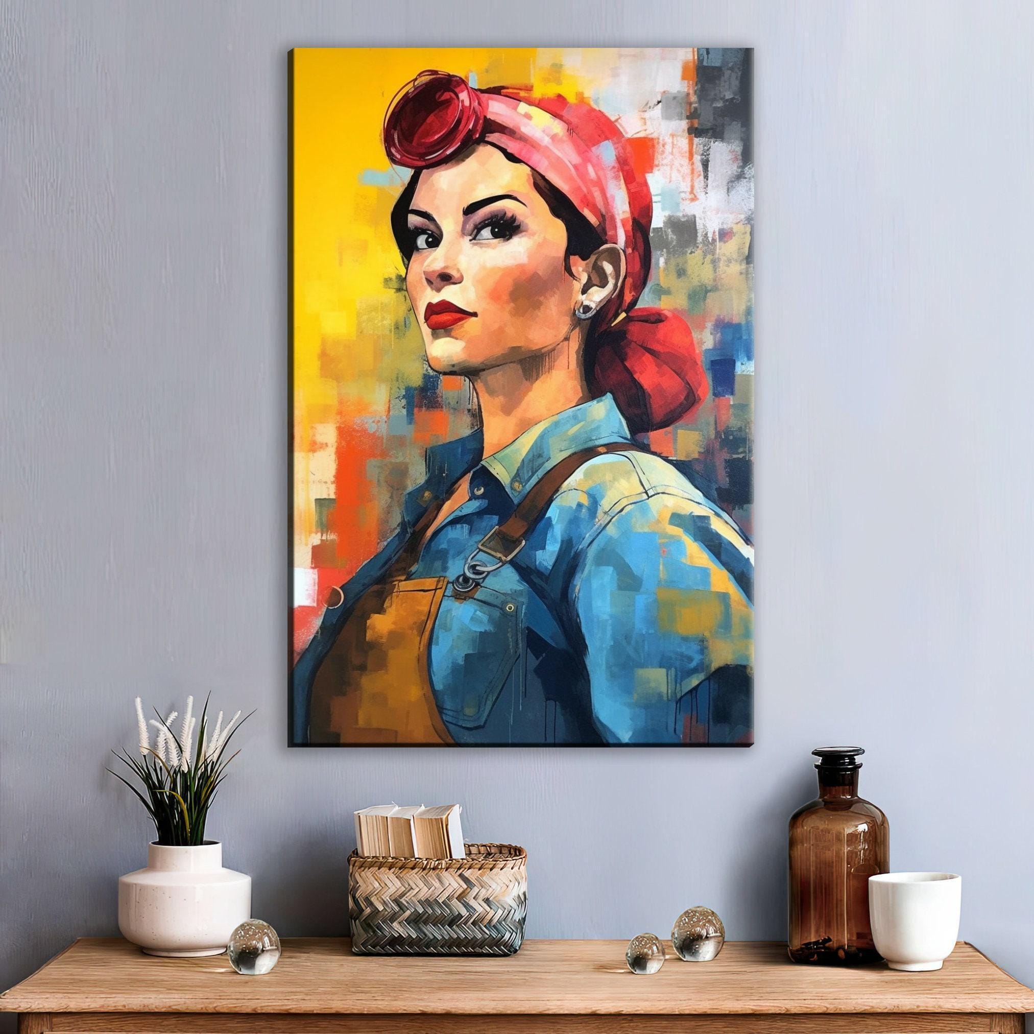a vibrant painting of a woman with a red headband, set against a colorful background. The painting is hung on a wall above a wooden table, which has various decorative items such as a vase, a bottle, and a basket.