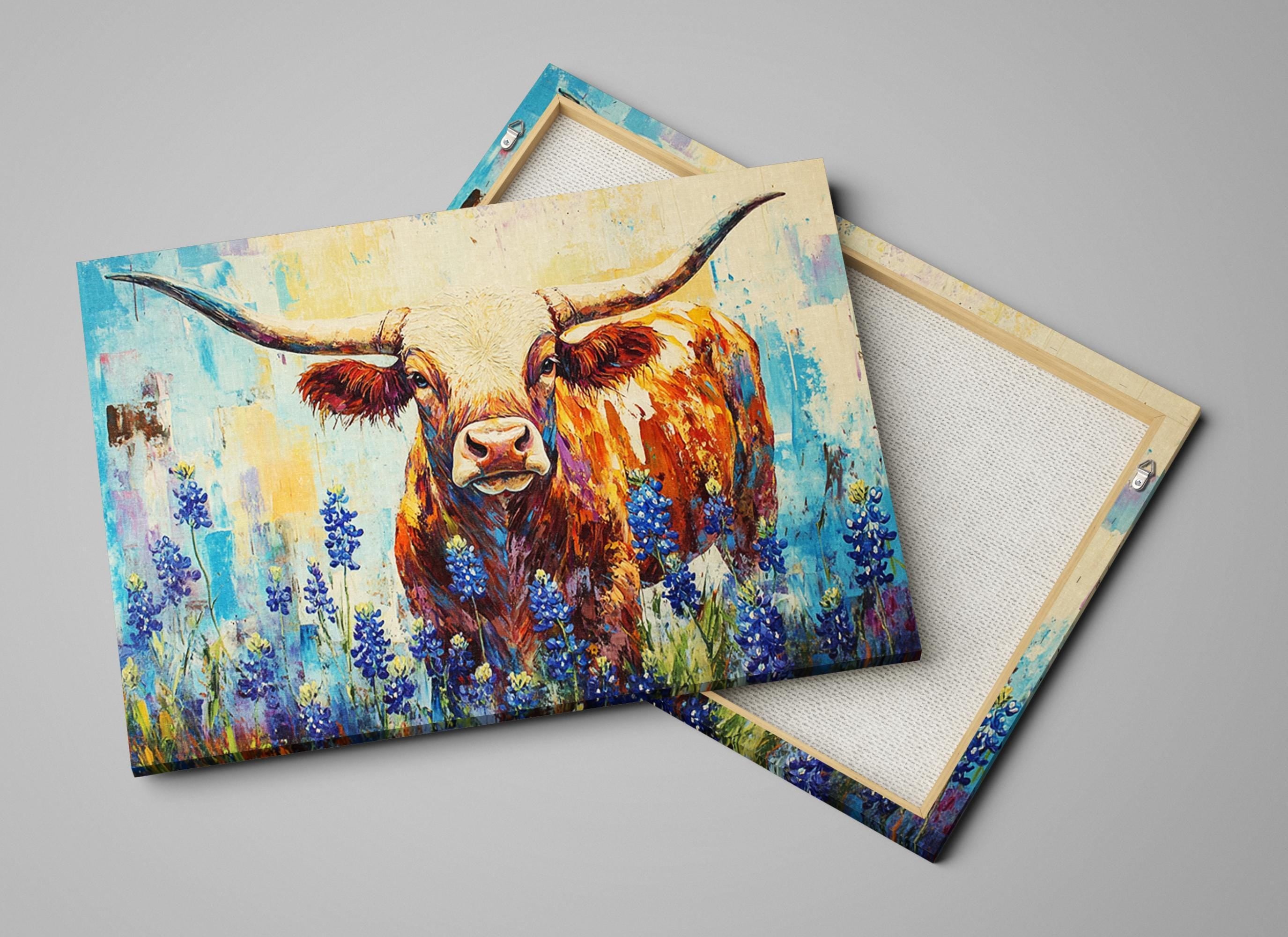 a painting of a bull with large horns, surrounded by a field of blue flowers.