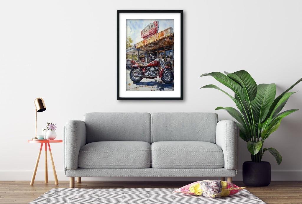 a gray sofa, a framed painting of a motorcycle, a red table lamp, a potted plant, and a patterned rug on a wooden floor.