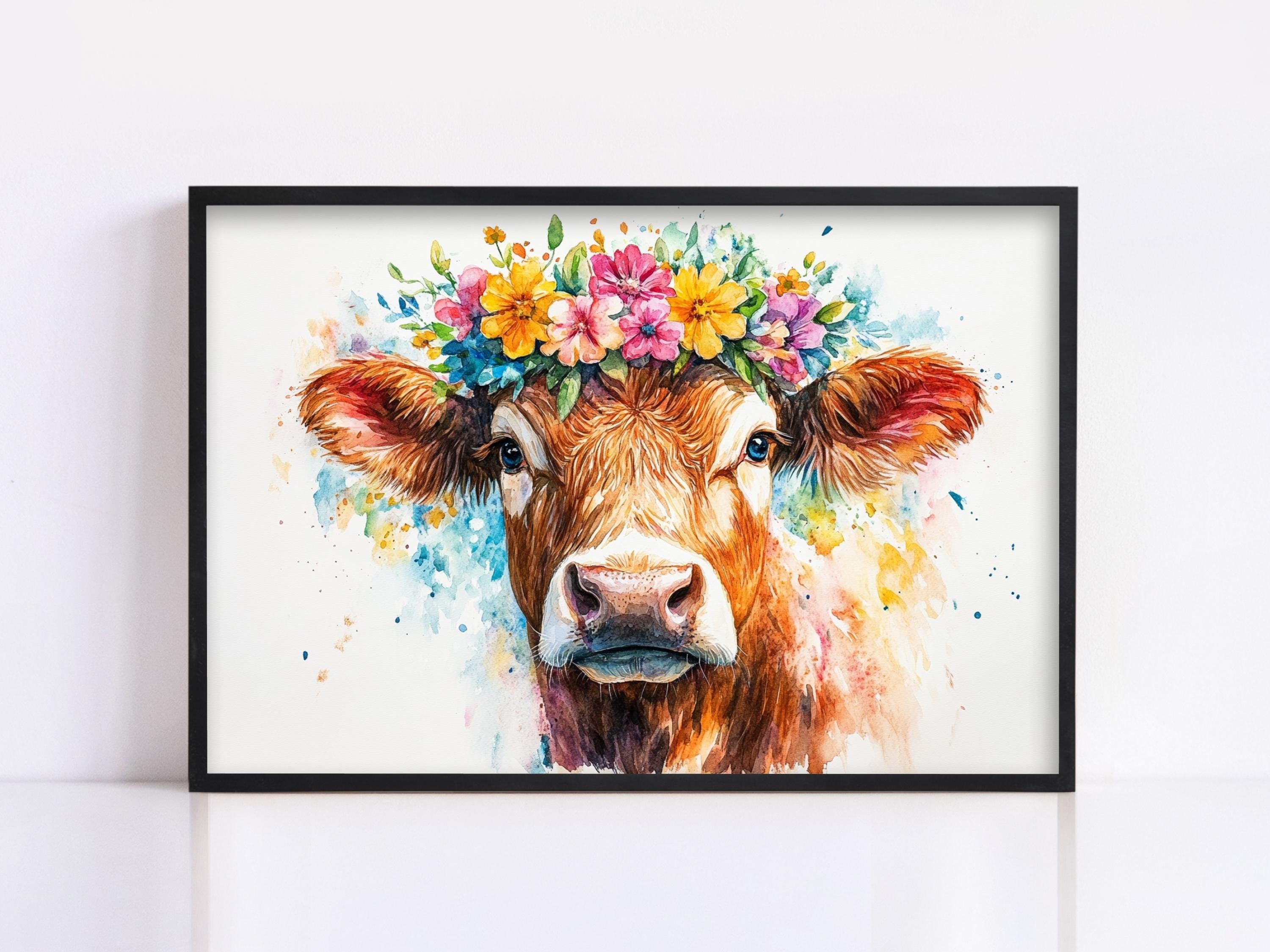 A framed painting of a cow with a colorful flower crown on its head.