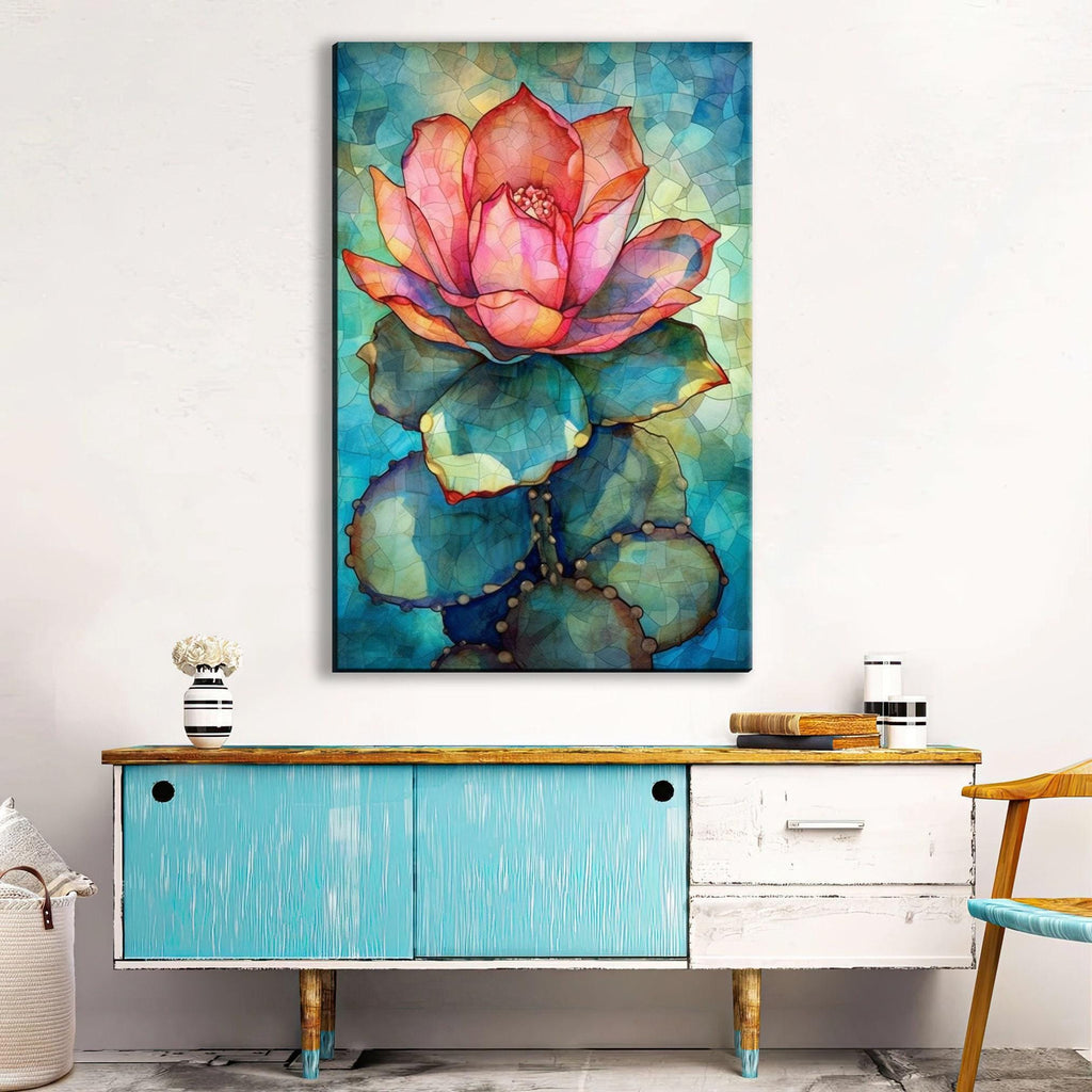 a vibrant painting of a cactus flower hanging on a wall above a blue cabinet with a wooden top.