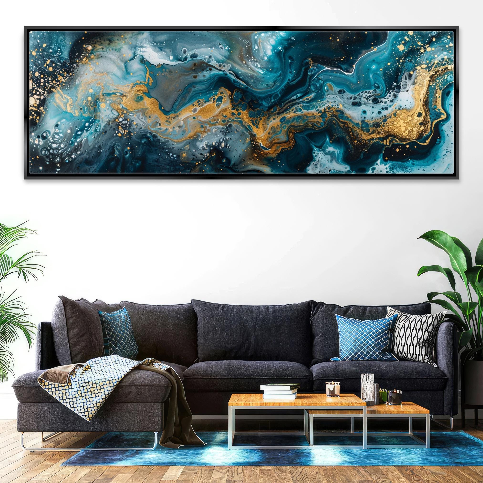 a living room with a couch and a painting on the wall