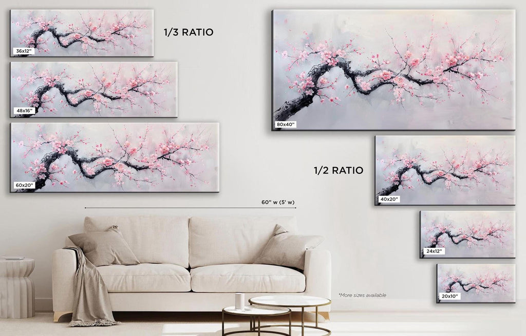a living room with a white couch and paintings on the wall
