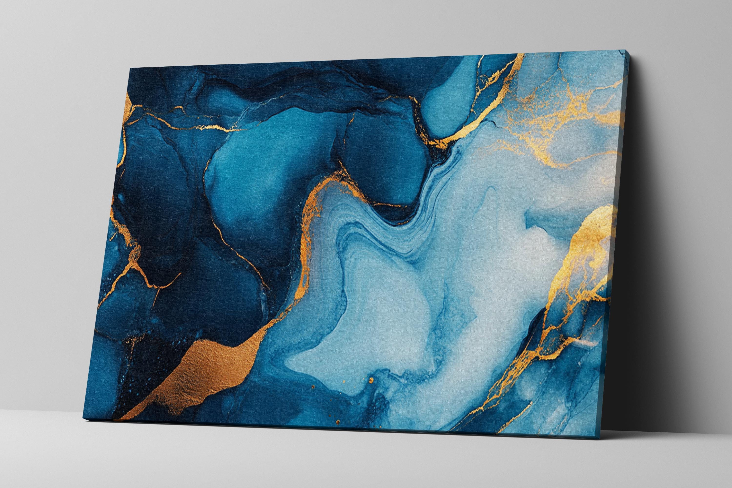 a blue and gold painting on a white wall