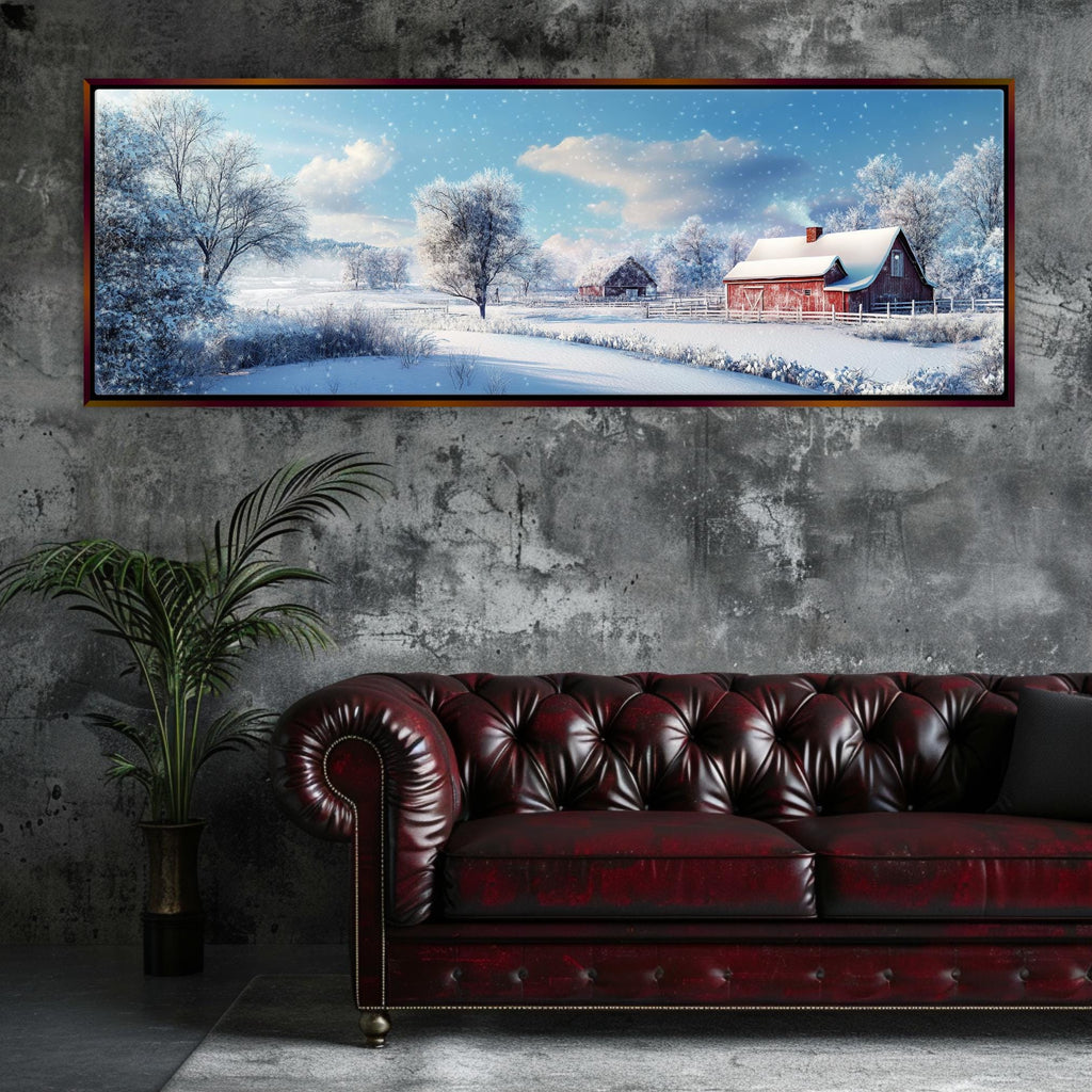 a red couch sitting in front of a painting on a wall