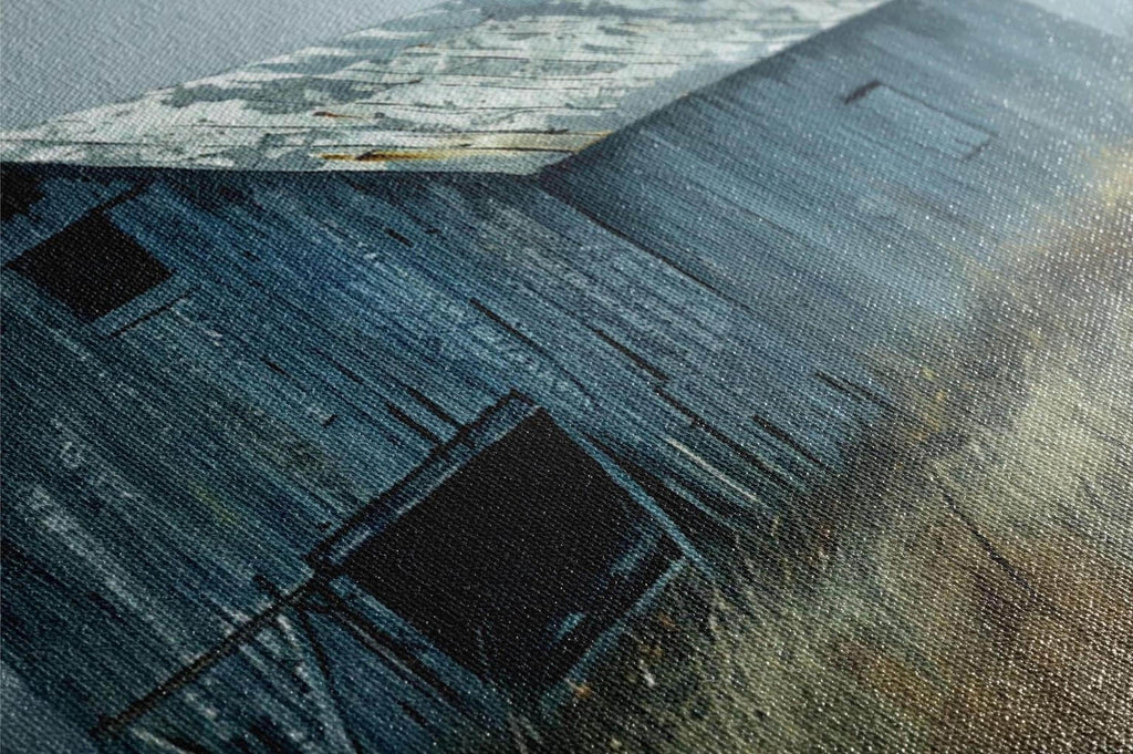 The image is a close-up of a weathered wooden structure, possibly a barn or shed, with a textured, aged appearance.